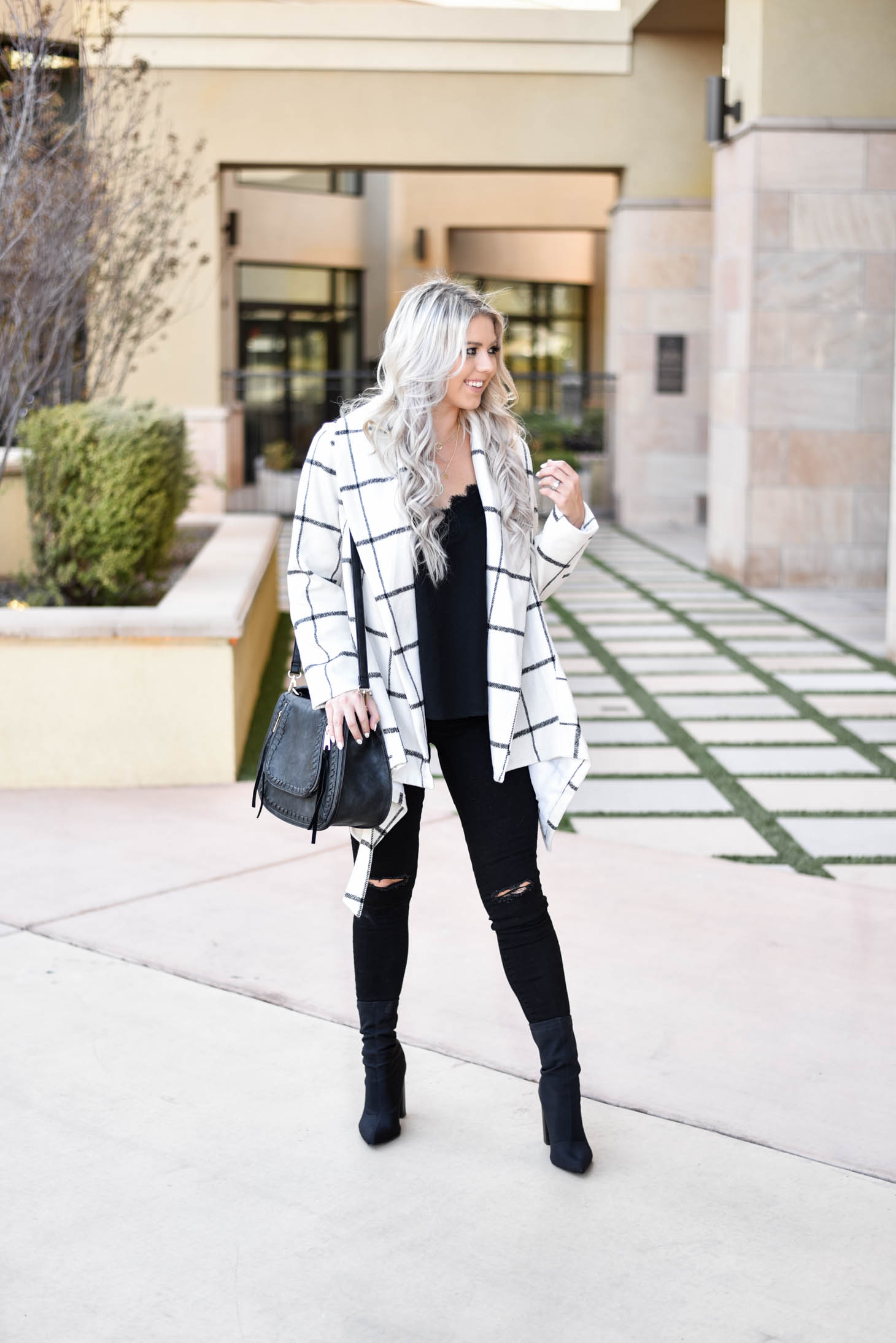 Erin Elizabeth of Wink and a Twirl shares the must have coat for Fall and Winter from Chicwish