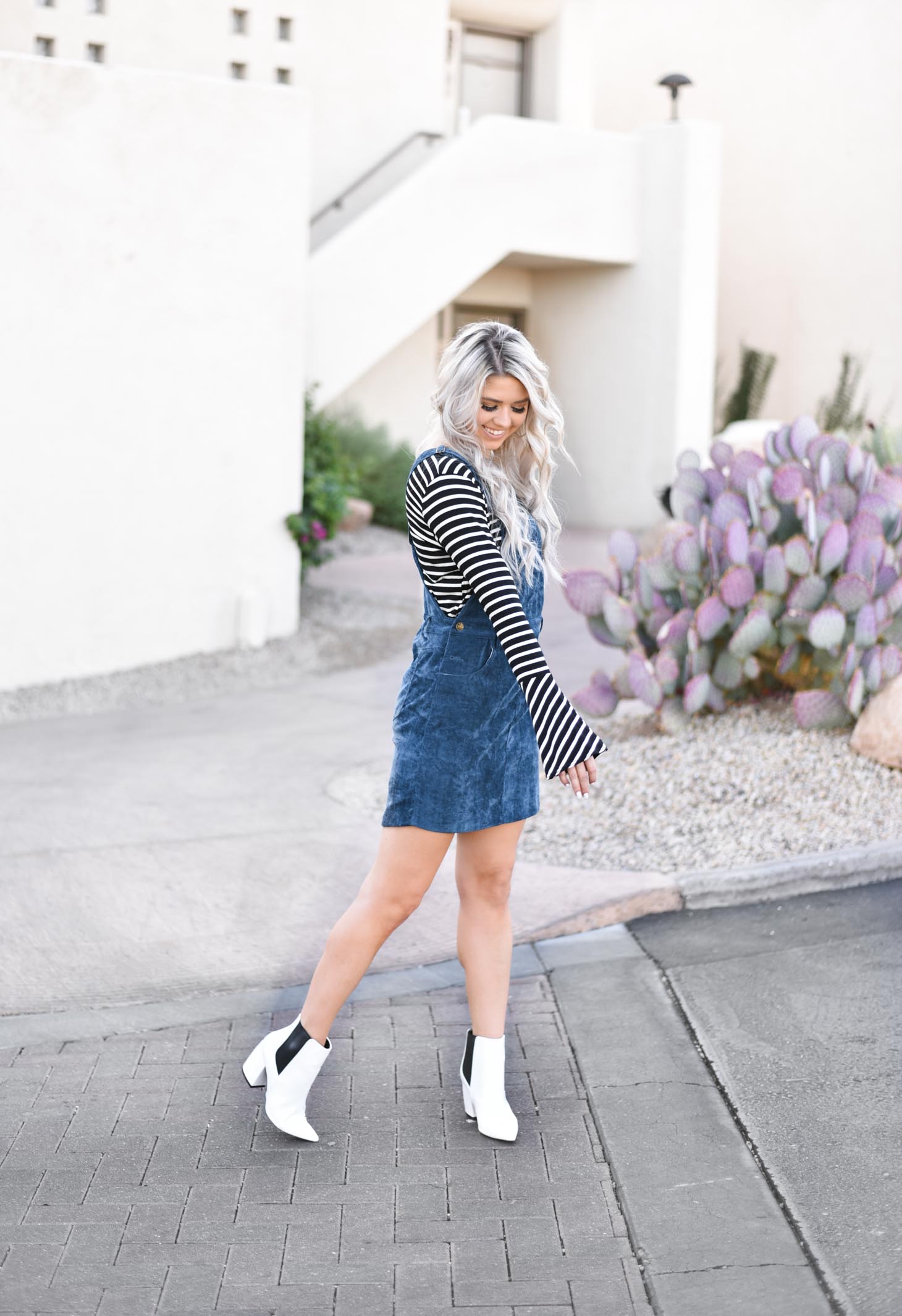 Erin Elizabeth of Wink and a Twirl shares the cutest blue jumper for Fall with Pink Lily Boutique