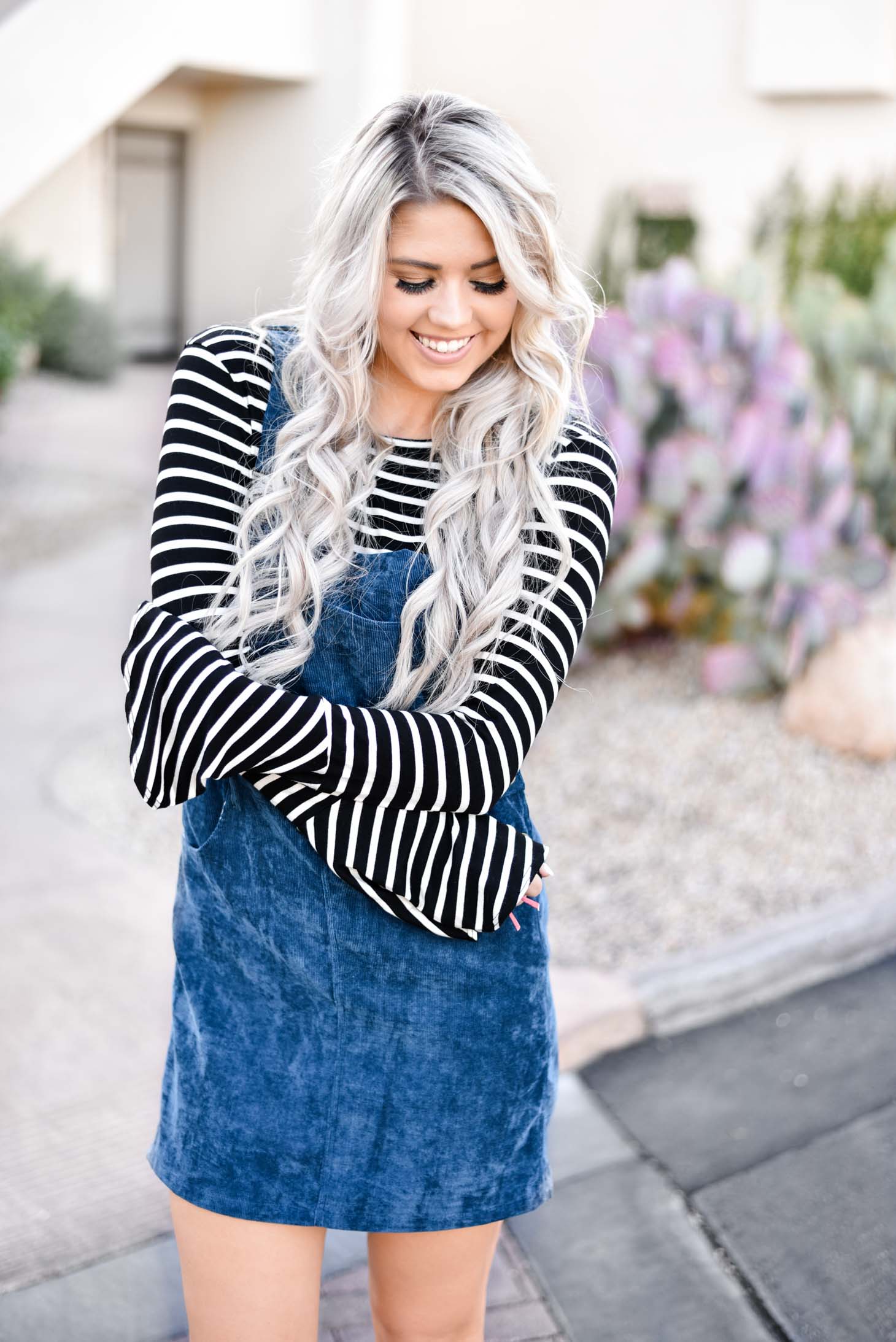 Erin Elizabeth of Wink and a Twirl shares the cutest blue jumper for Fall with Pink Lily Boutique