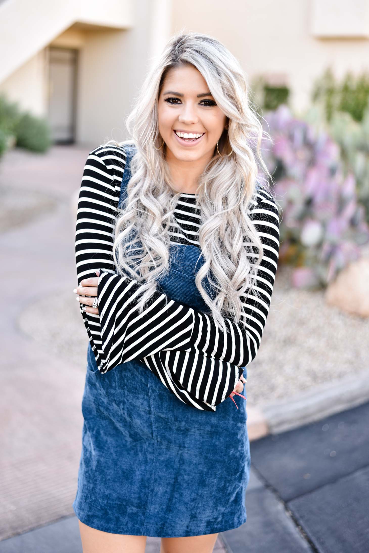 Erin Elizabeth of Wink and a Twirl shares the cutest blue jumper for Fall with Pink Lily Boutique