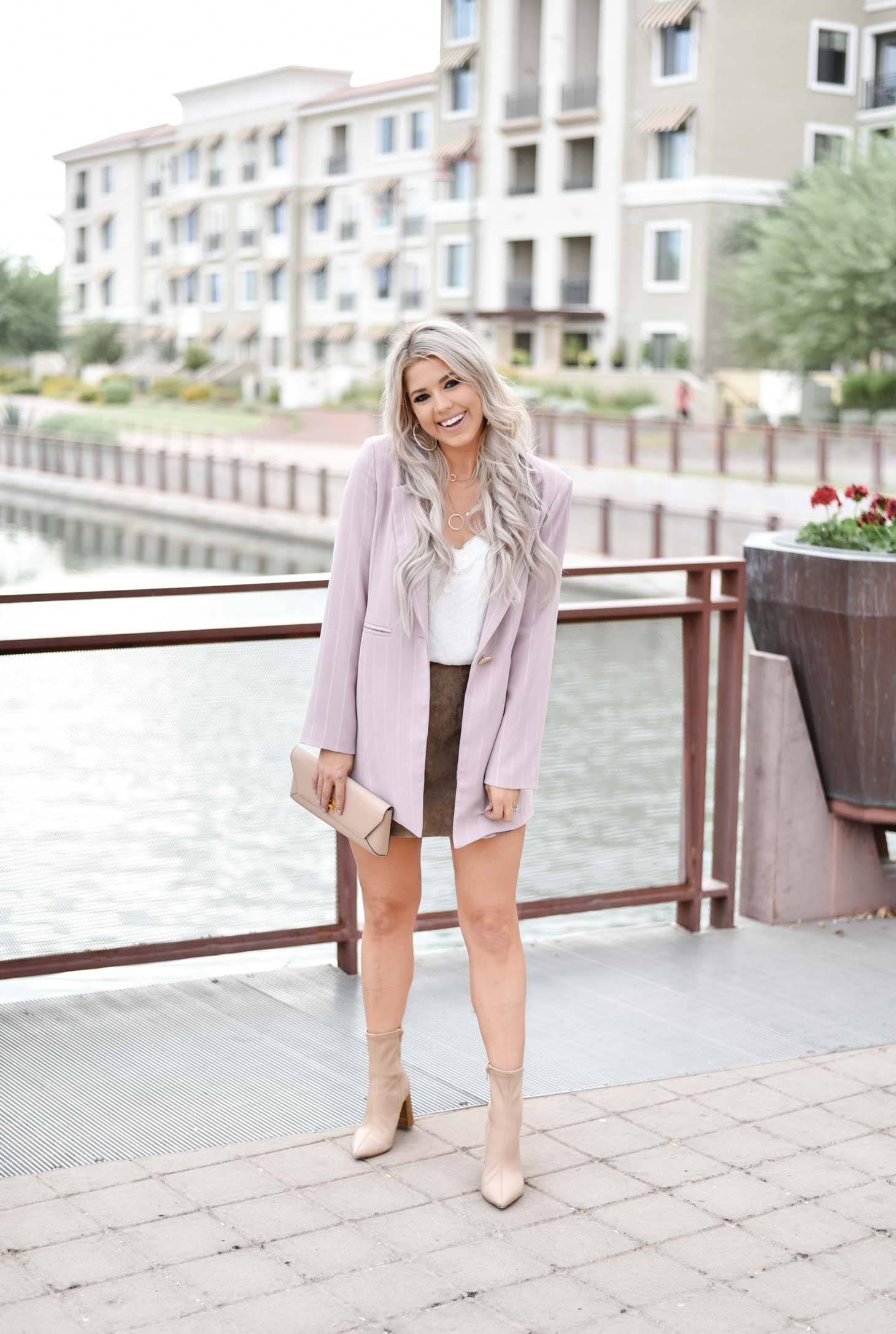 Erin Elizabeth of Wink and a Twirl shares the cutest pinstriped blush blazer from Chicwish