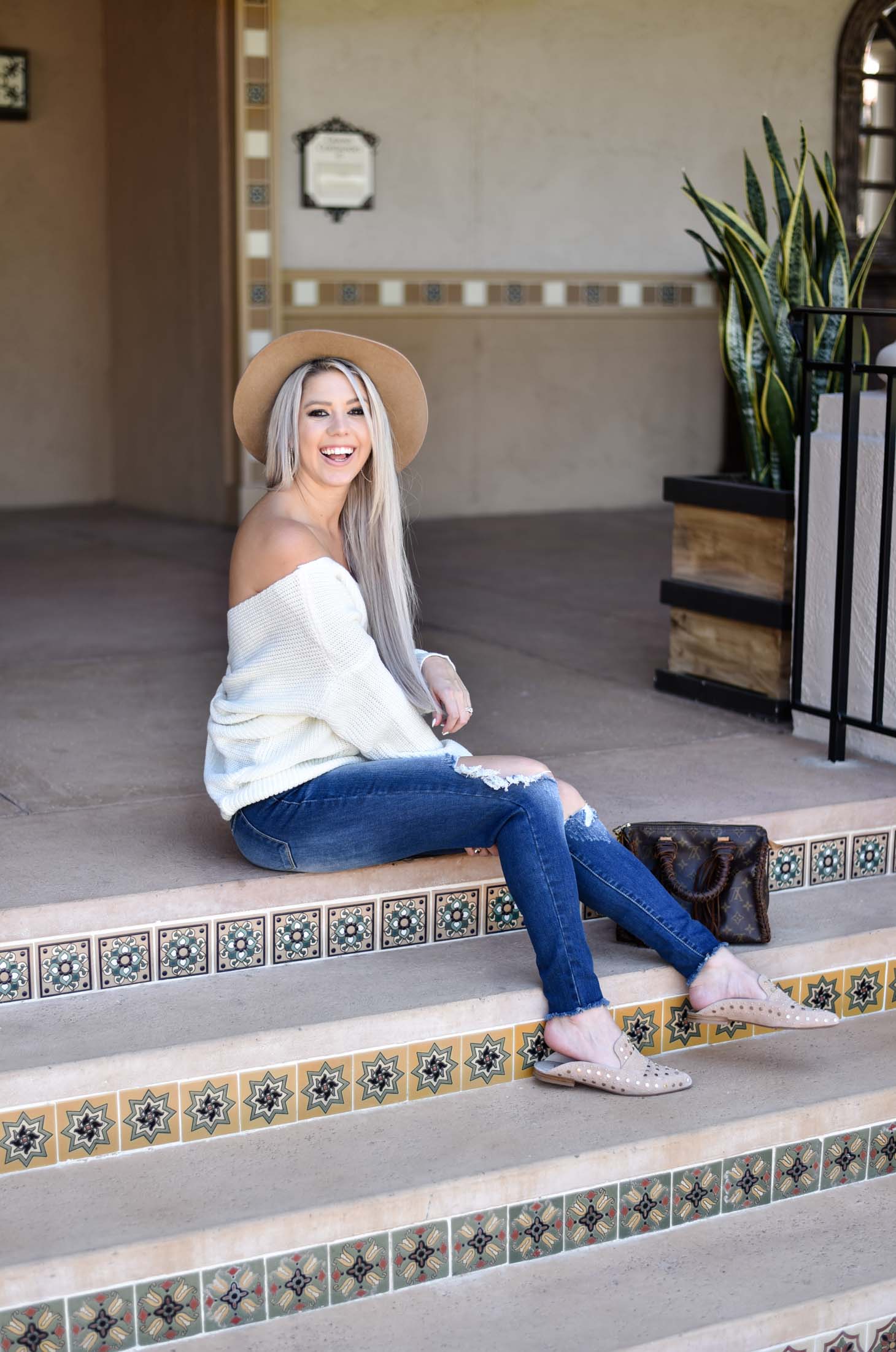 Erin Elizabeth of Wink and a Twirl shares the cutest off the shoulder sweater from Chicwish