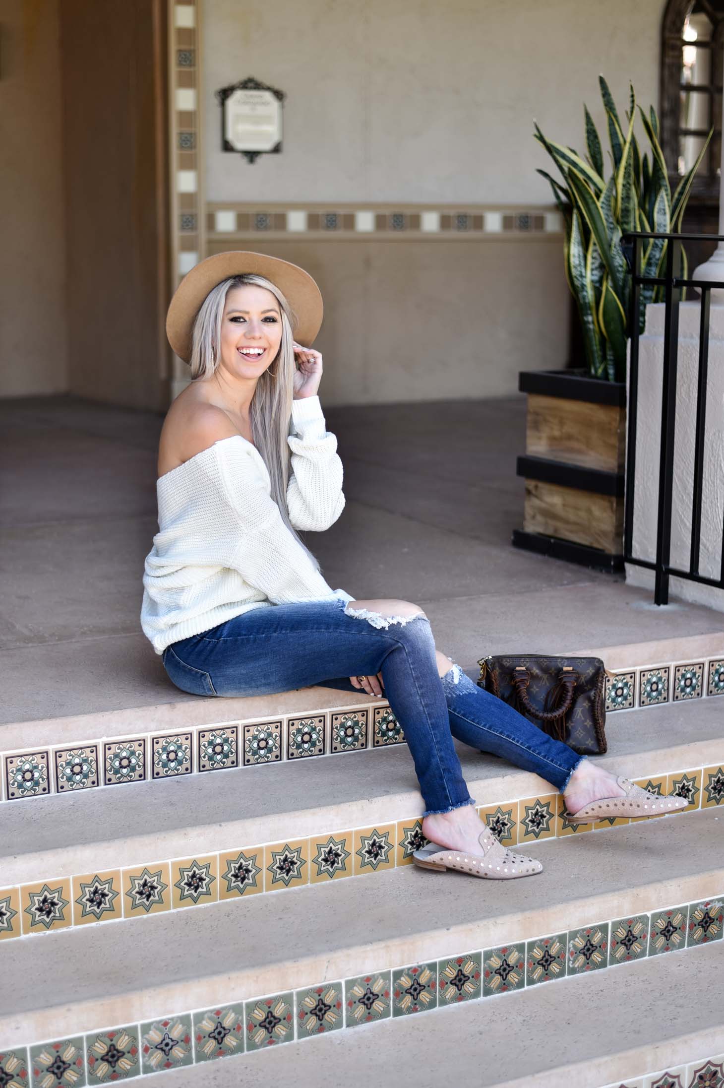 Erin Elizabeth of Wink and a Twirl shares the cutest off the shoulder sweater from Chicwish