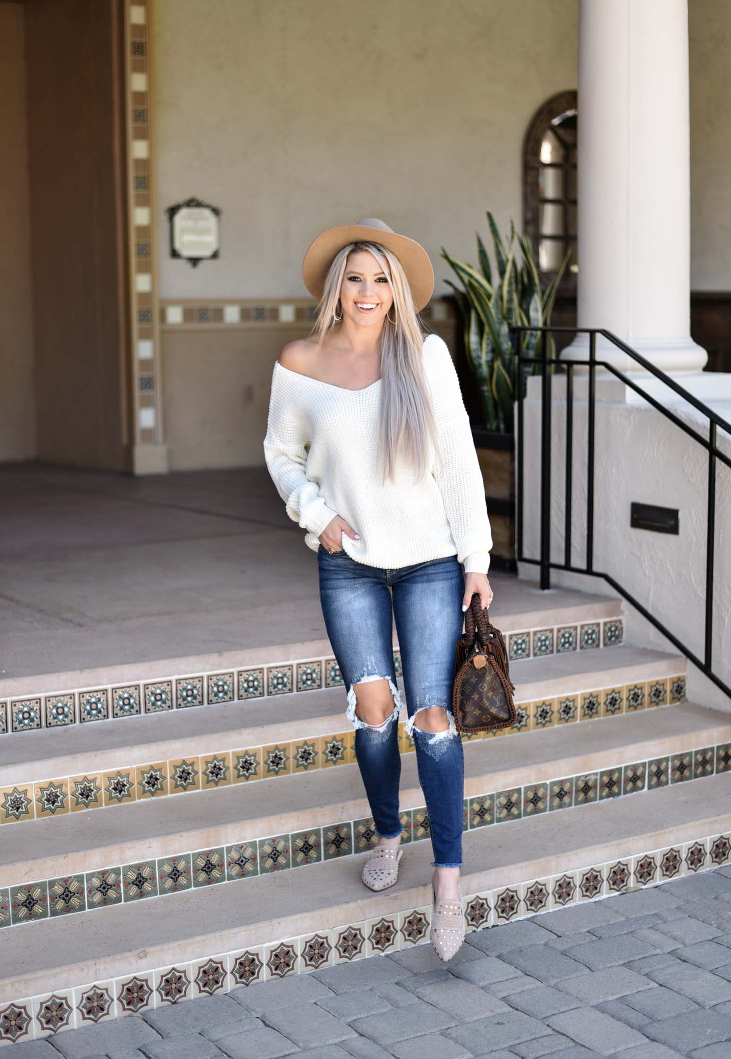 Erin Elizabeth of Wink and a Twirl shares the cutest off the shoulder sweater from Chicwish