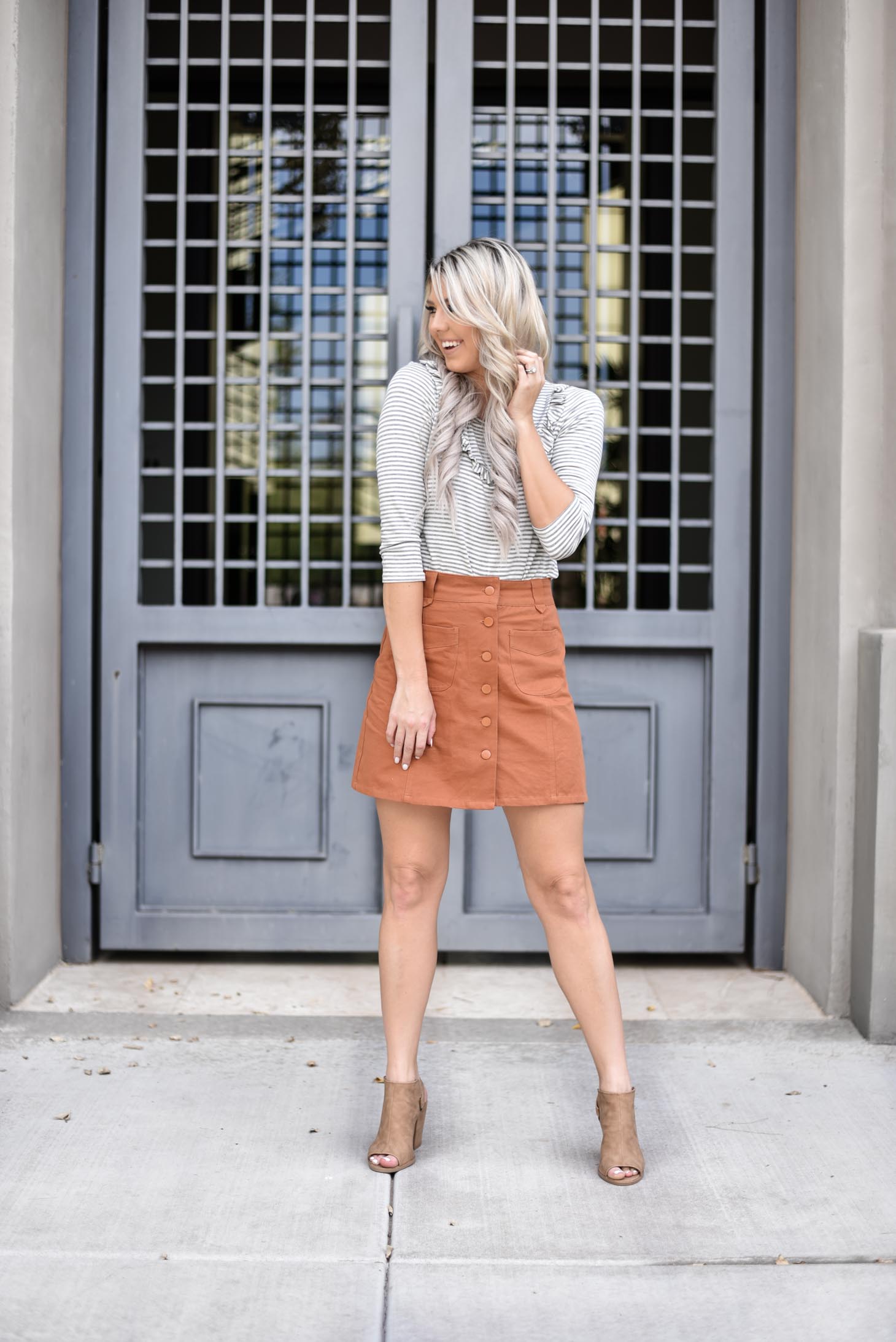 Erin Elizabeth of Wink and a Twirl shares two ways to style a Pink Lily Boutique striped top from day to night