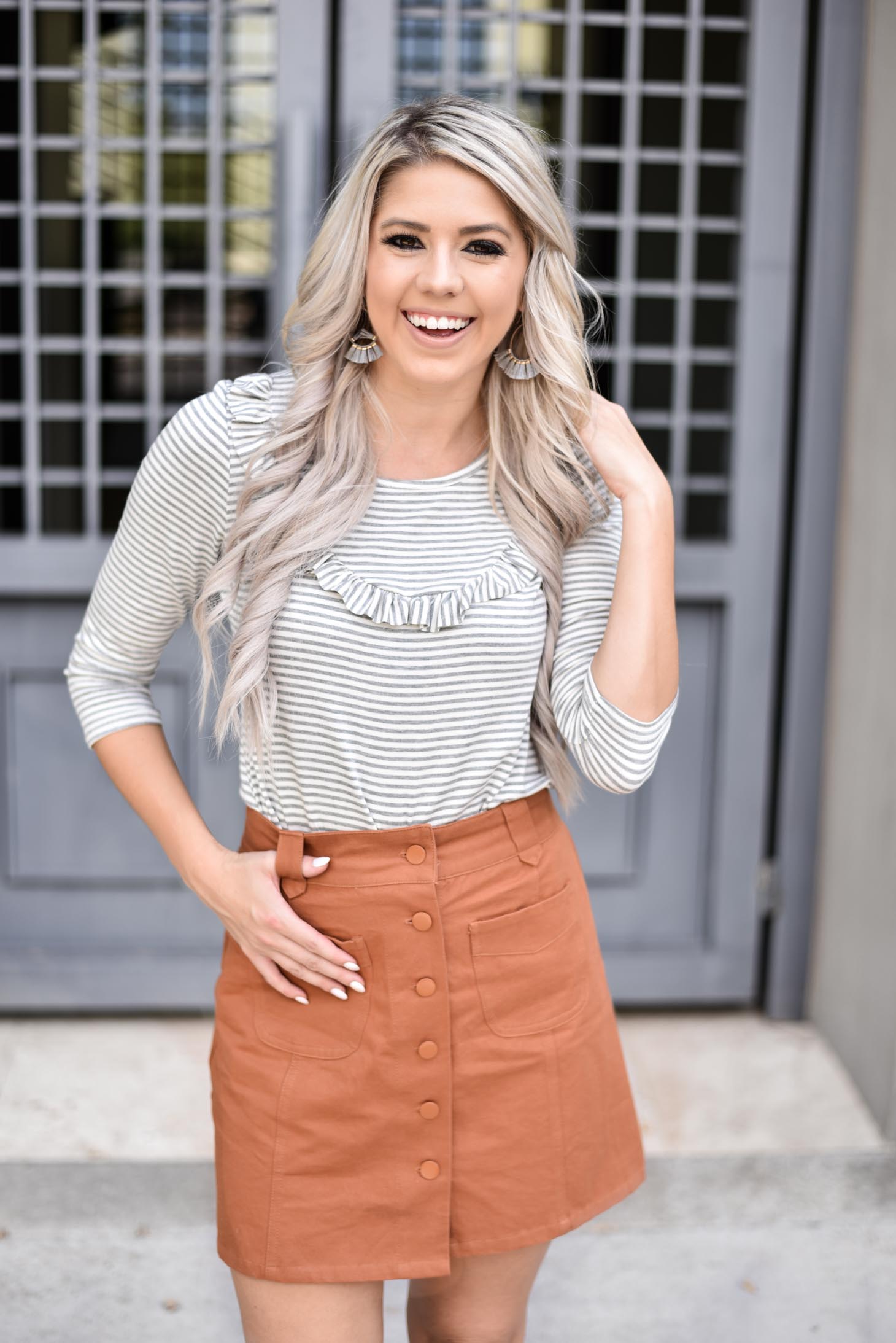 Erin Elizabeth of Wink and a Twirl shares two ways to style a Pink Lily Boutique striped top from day to night