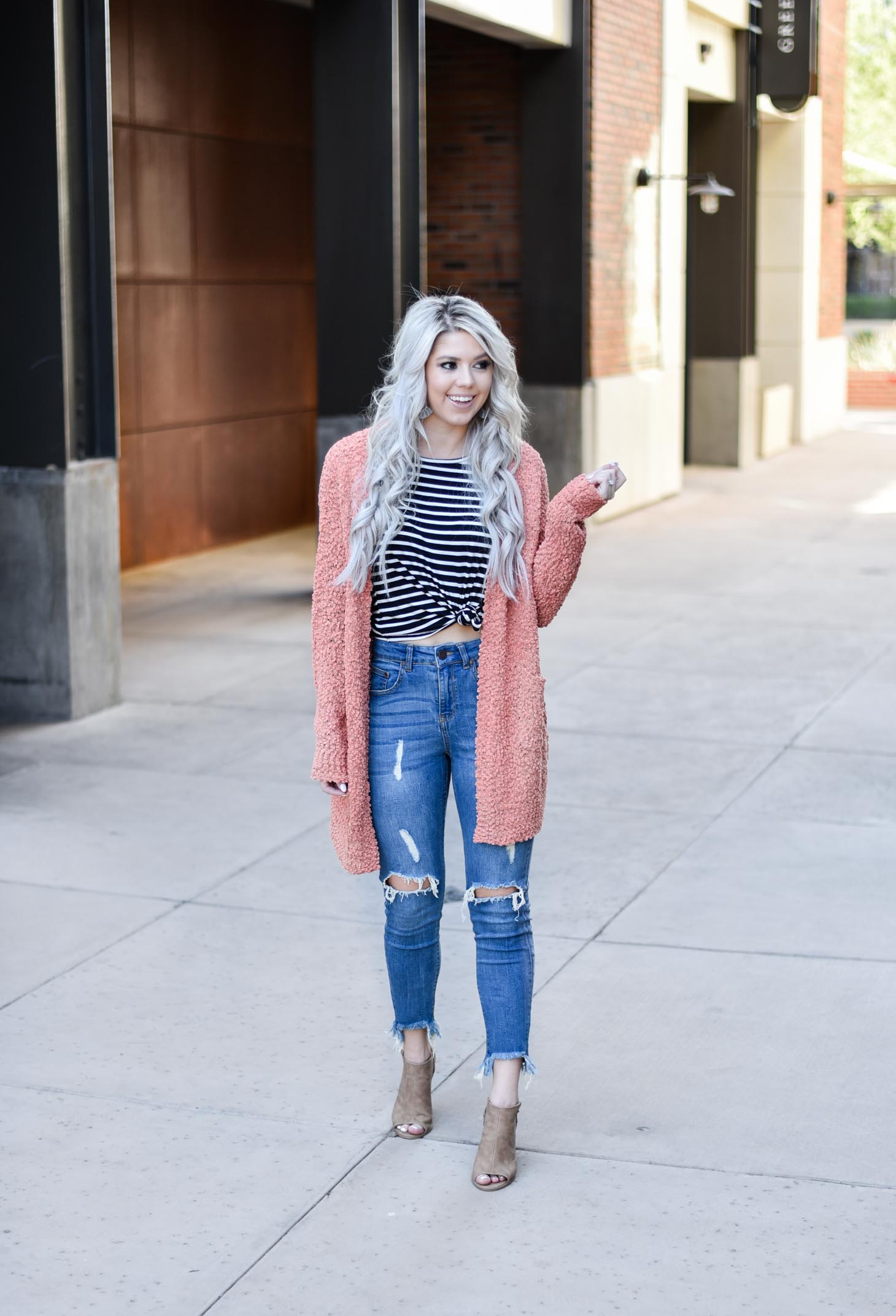 Erin Elizabeth of Wink and a Twirl shares two ways to style a striped top from Pink Lily Boutique perfect for your fall style this year