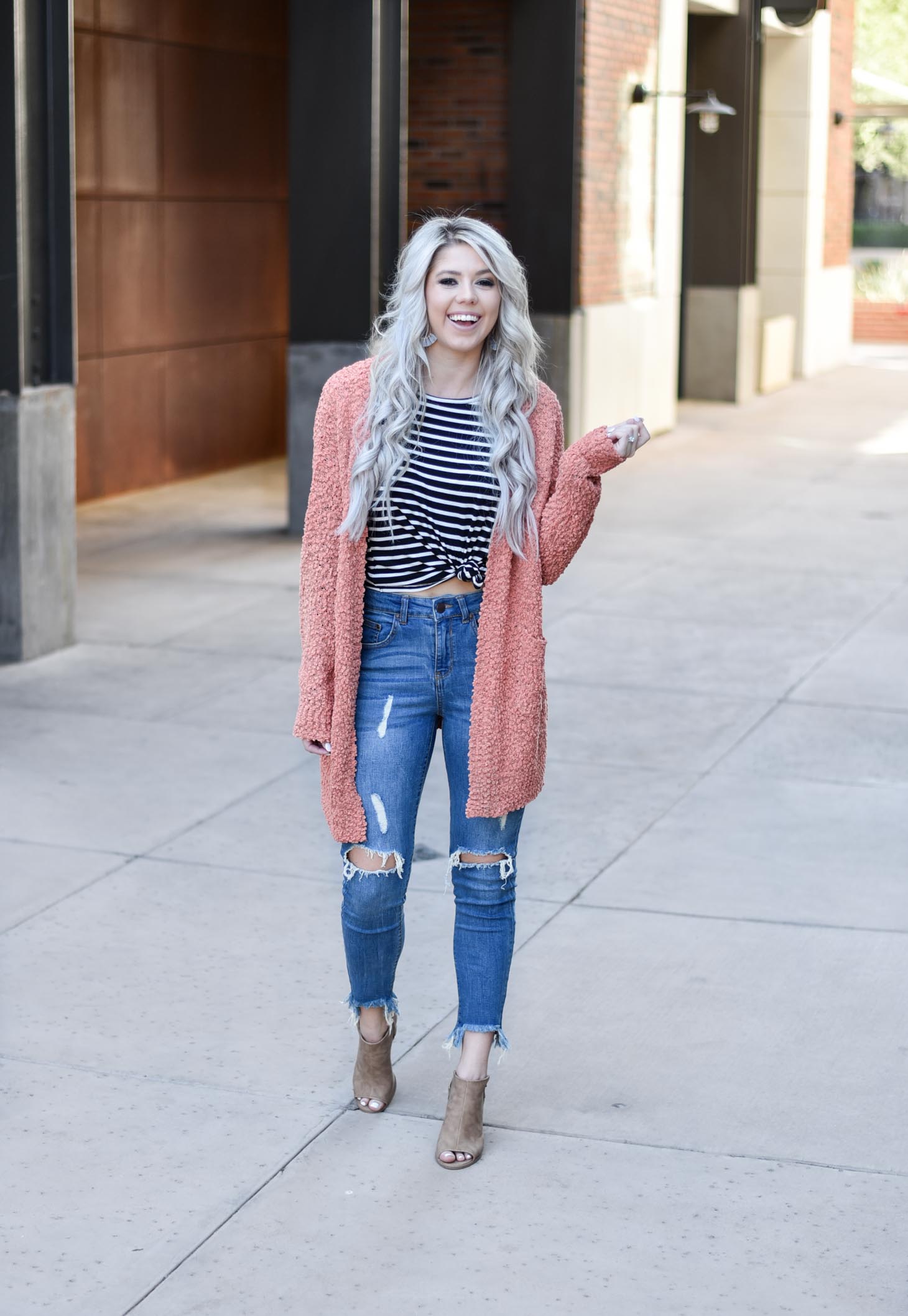 Erin Elizabeth of Wink and a Twirl shares two ways to style a striped top from Pink Lily Boutique perfect for your fall style this year