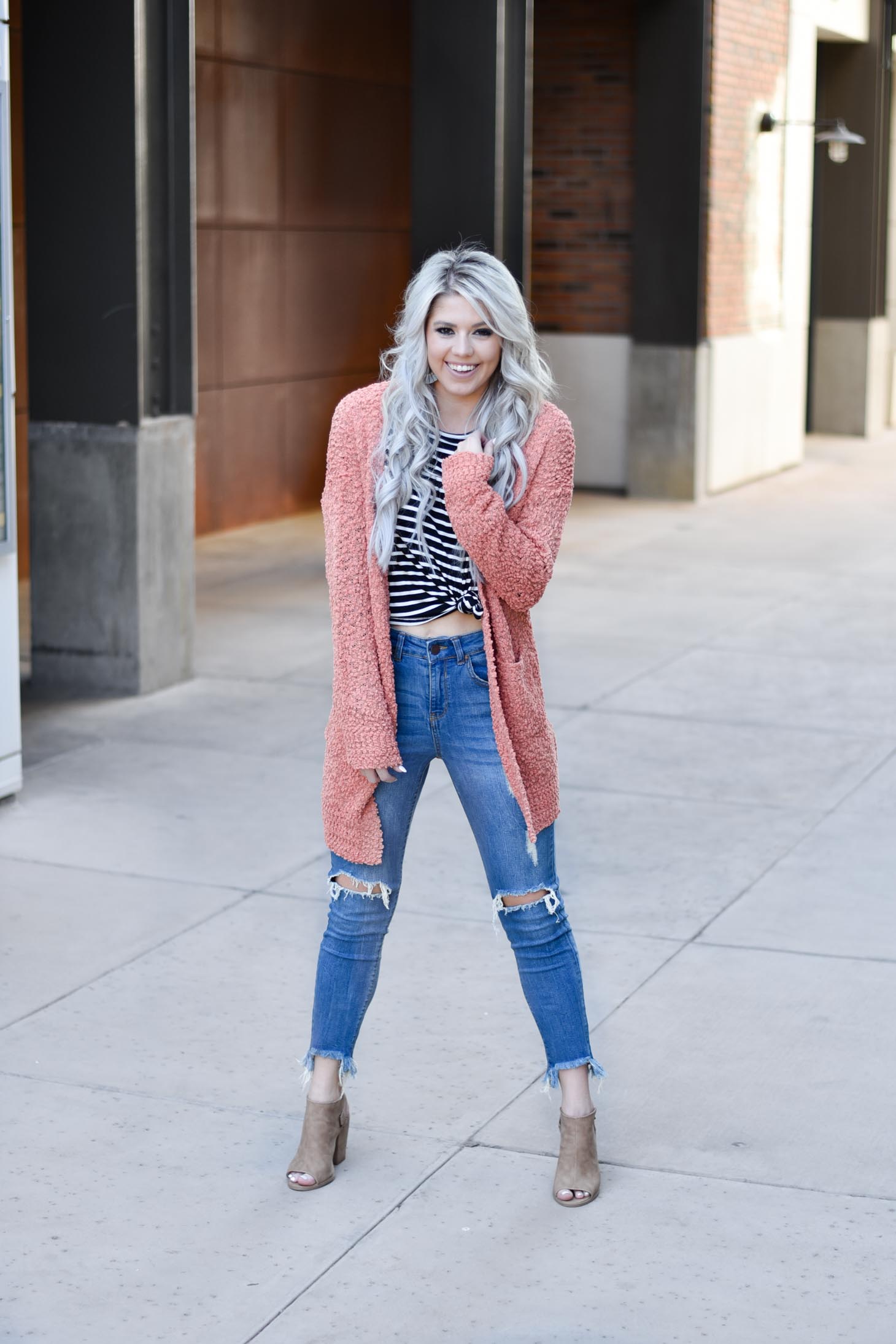 Erin Elizabeth of Wink and a Twirl shares two ways to style a striped top from Pink Lily Boutique perfect for your fall style this year