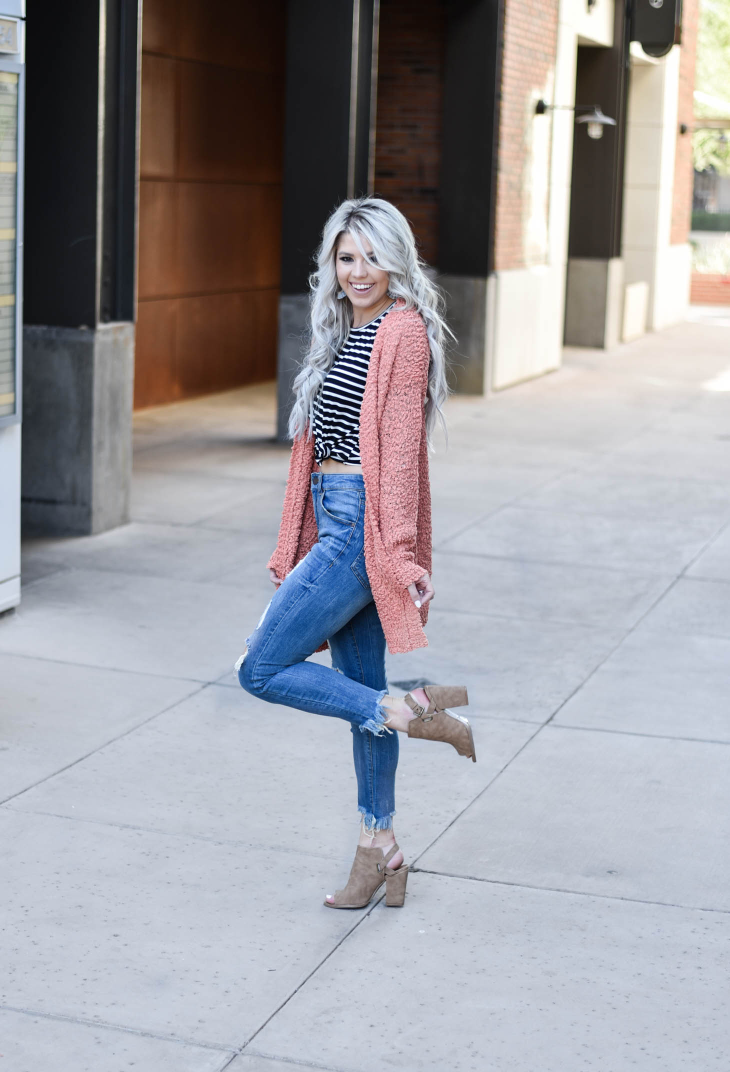 Erin Elizabeth of Wink and a Twirl shares two ways to style a striped top from Pink Lily Boutique perfect for your fall style this year