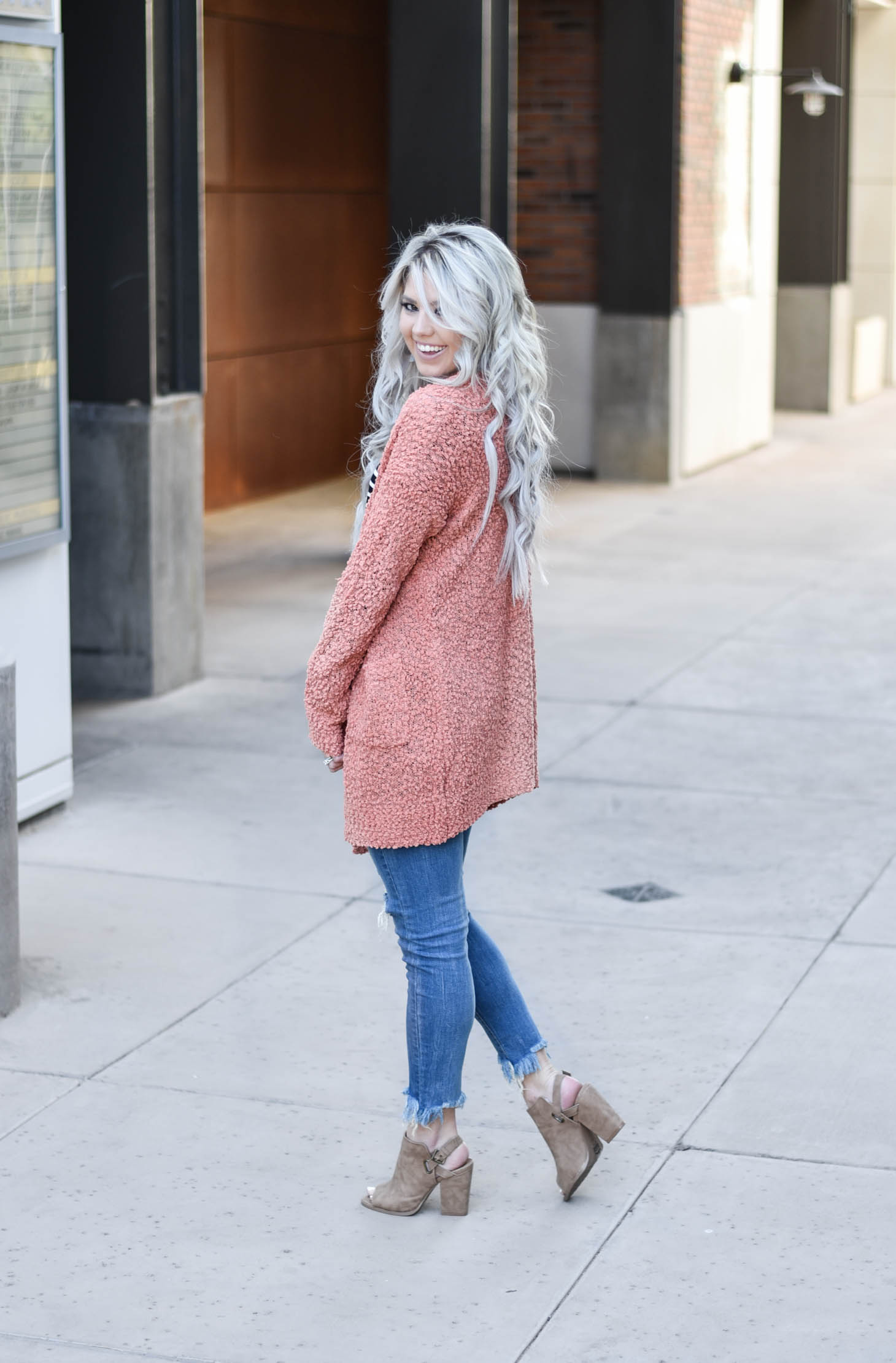 Erin Elizabeth of Wink and a Twirl shares two ways to style a striped top from Pink Lily Boutique perfect for your fall style this year