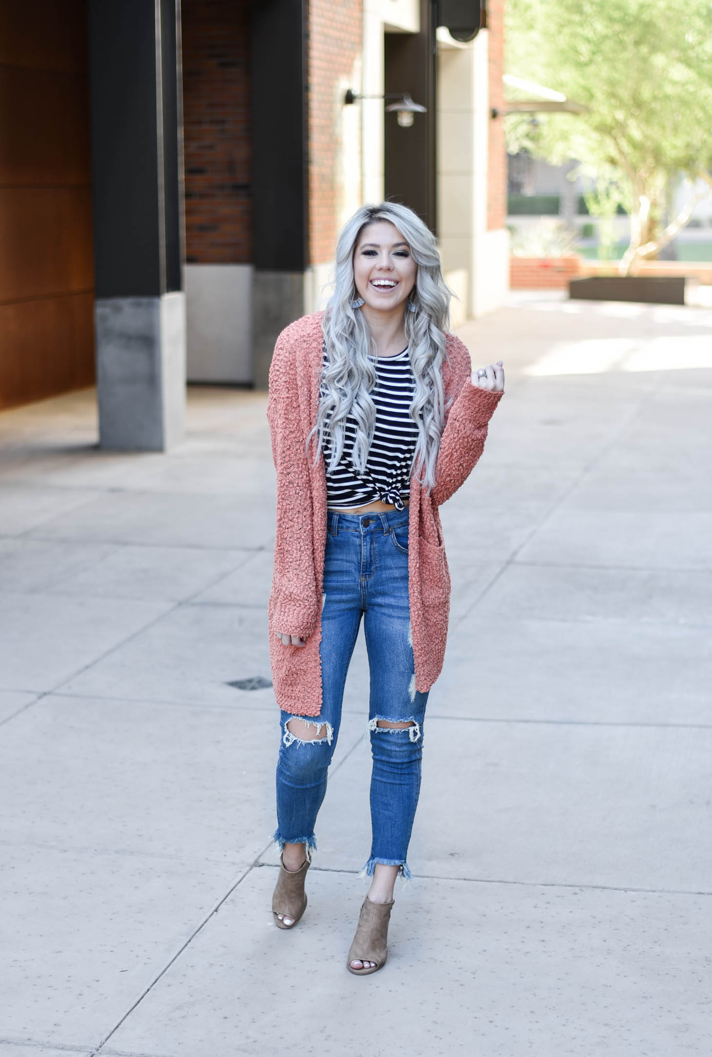 Erin Elizabeth of Wink and a Twirl shares two ways to style a striped top from Pink Lily Boutique perfect for your fall style this year