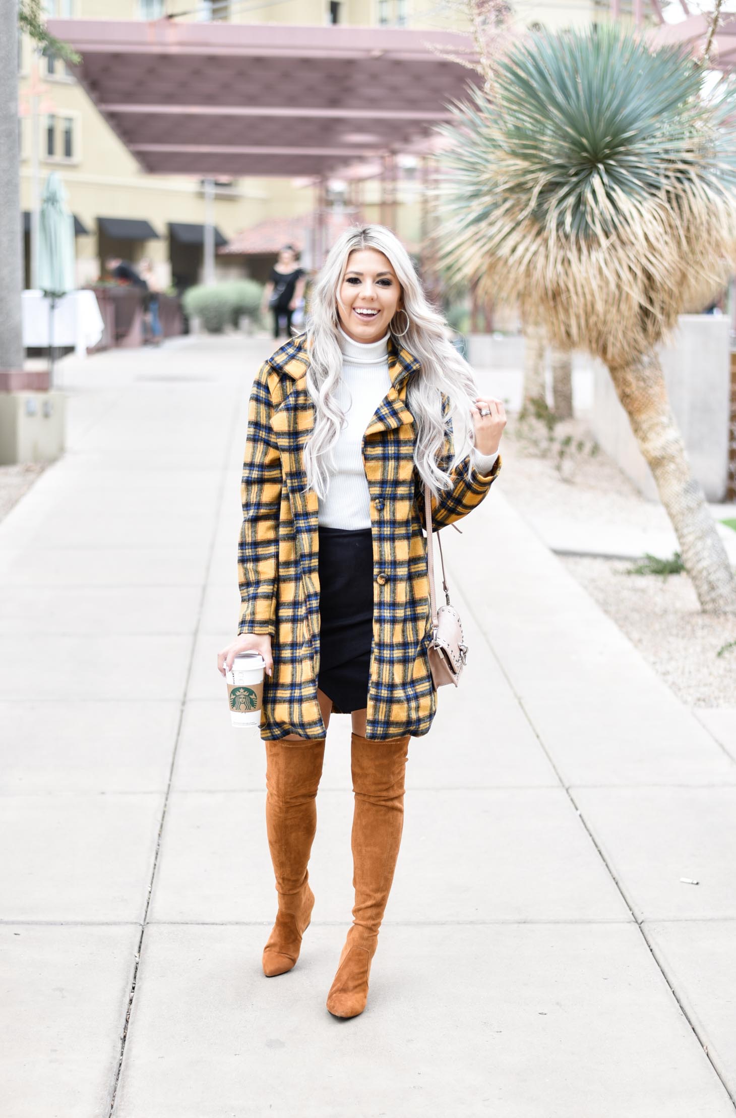 Erin Elizabeth of Wink and a Twirl shares this fabulous plaid coat from Shop Priceless