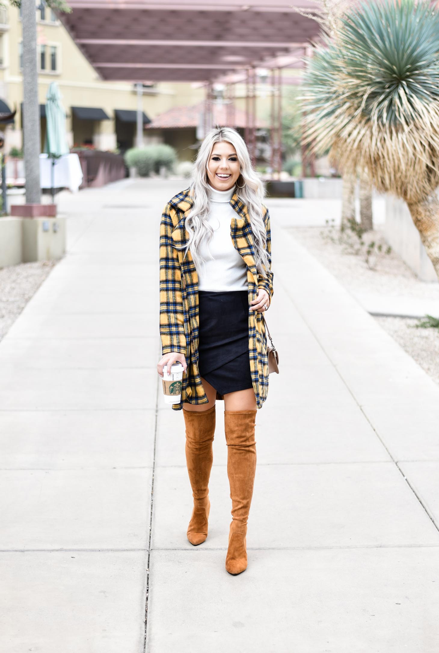 Erin Elizabeth of Wink and a Twirl shares this fabulous plaid coat from Shop Priceless