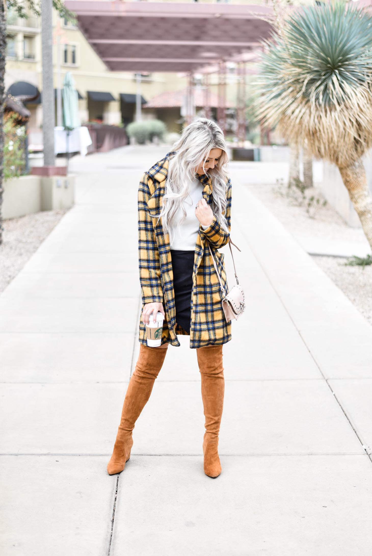 Erin Elizabeth of Wink and a Twirl shares this fabulous plaid coat from Shop Priceless