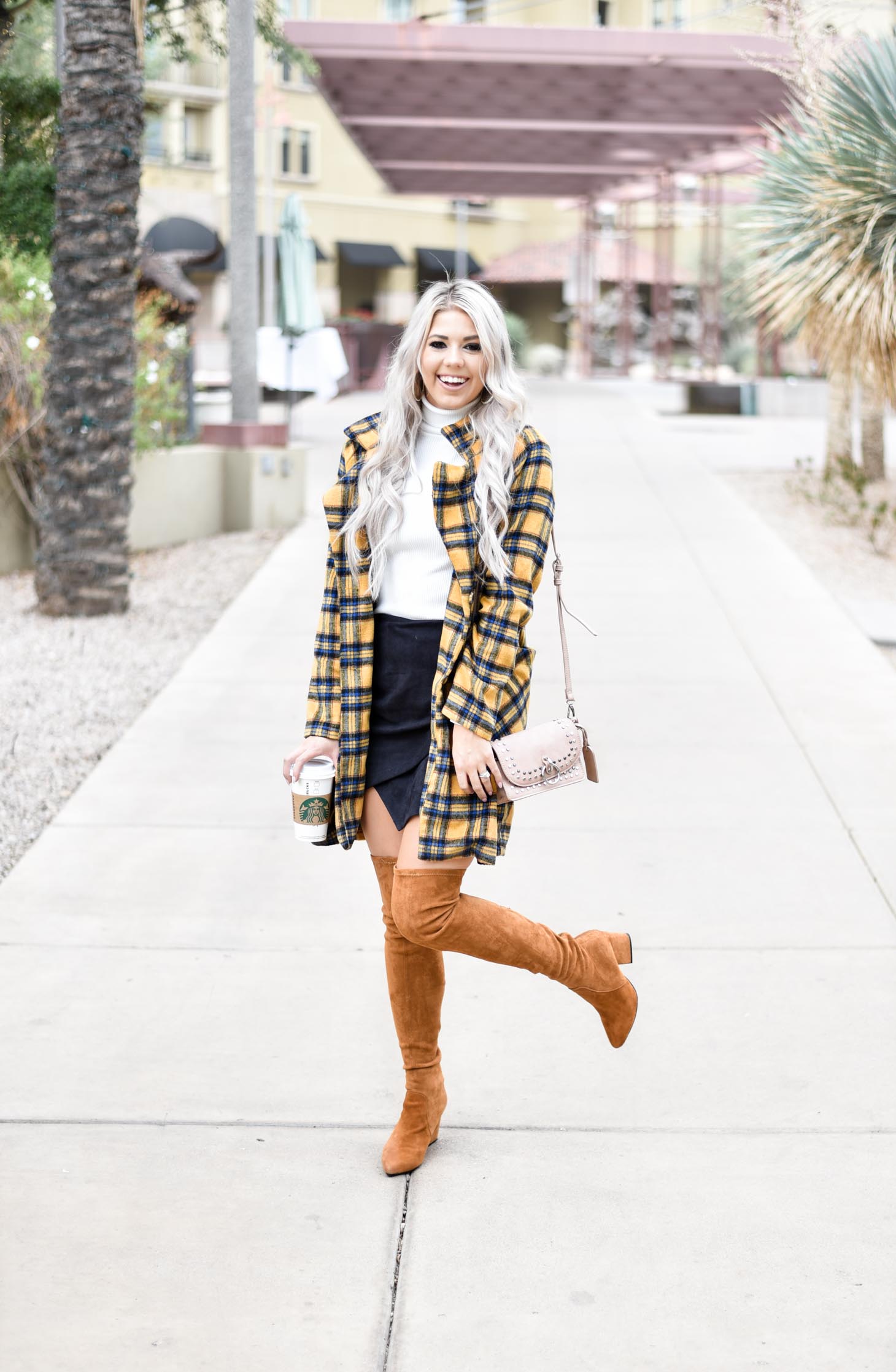 Erin Elizabeth of Wink and a Twirl shares this fabulous plaid coat from Shop Priceless