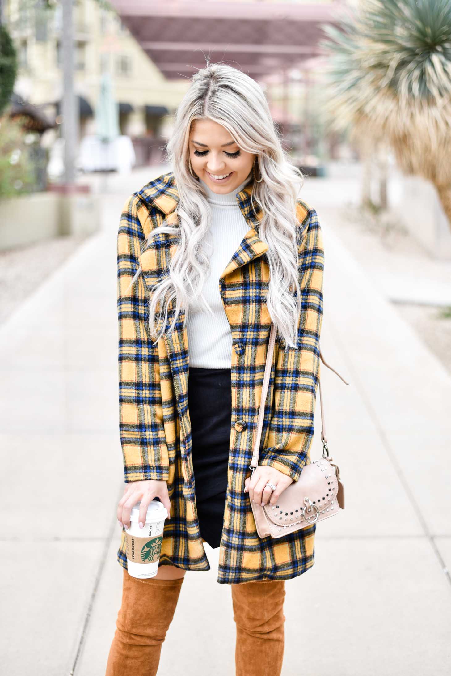 Erin Elizabeth of Wink and a Twirl shares this fabulous plaid coat from Shop Priceless