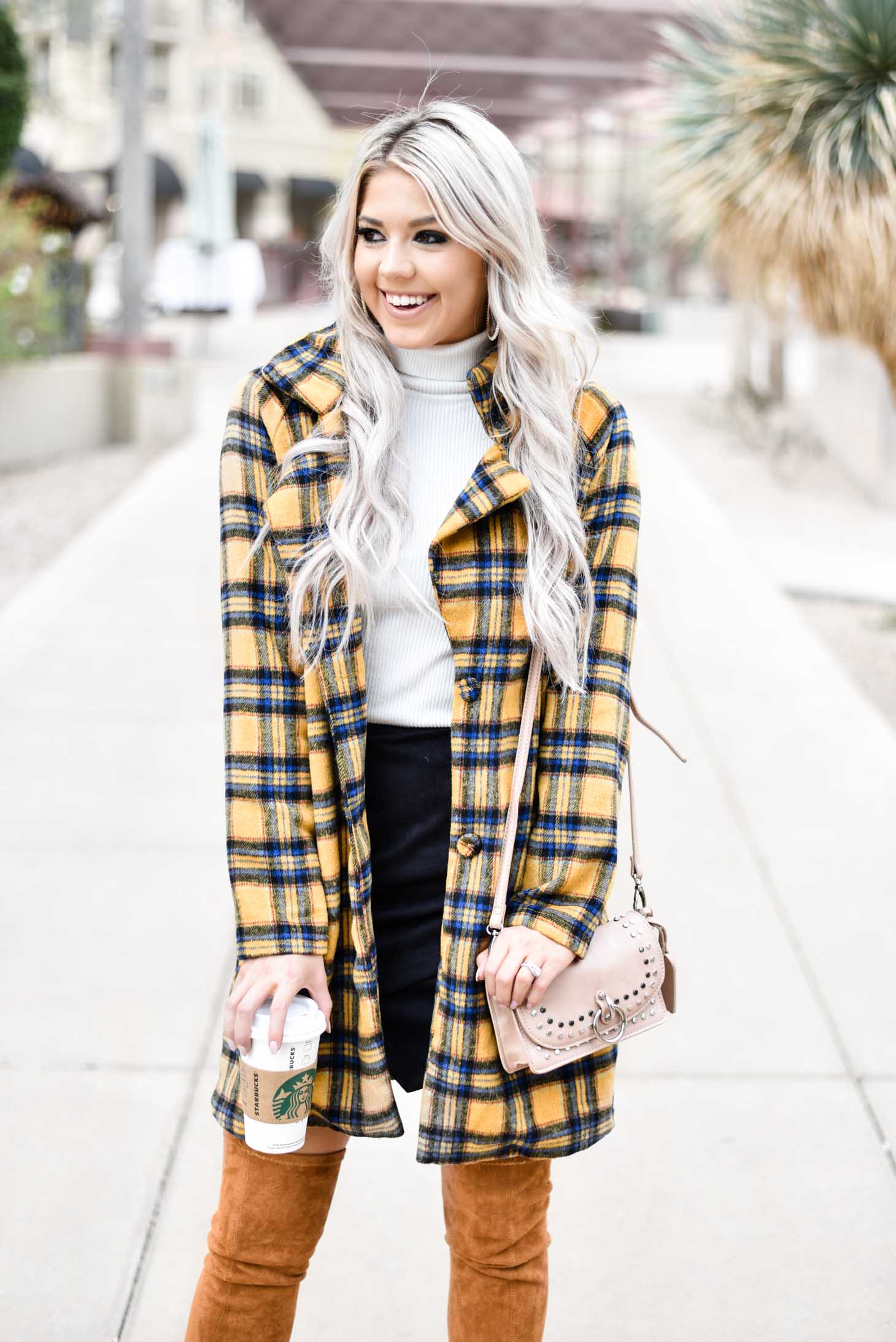 Erin Elizabeth of Wink and a Twirl shares this fabulous plaid coat from Shop Priceless