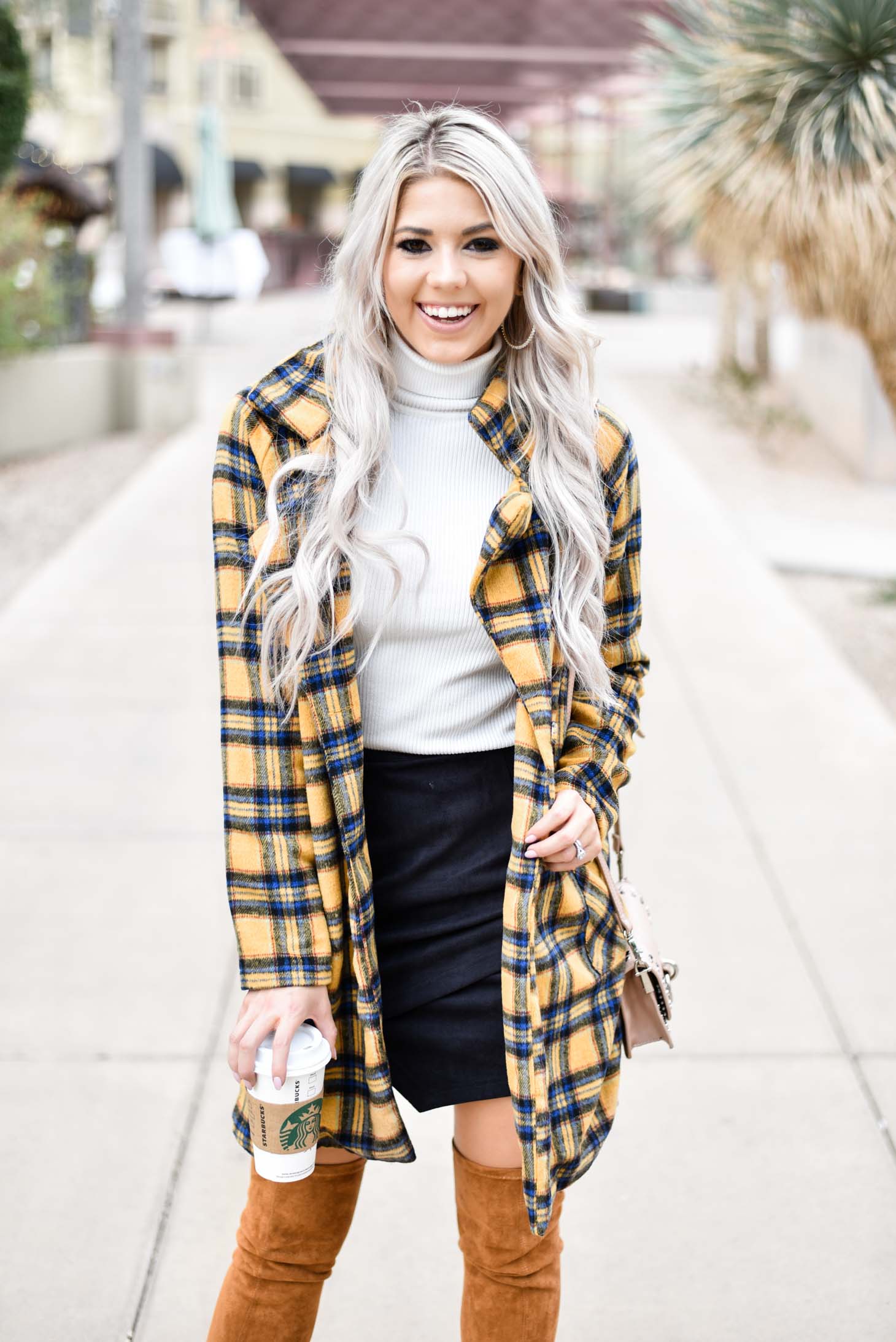 Erin Elizabeth of Wink and a Twirl shares this fabulous plaid coat from Shop Priceless
