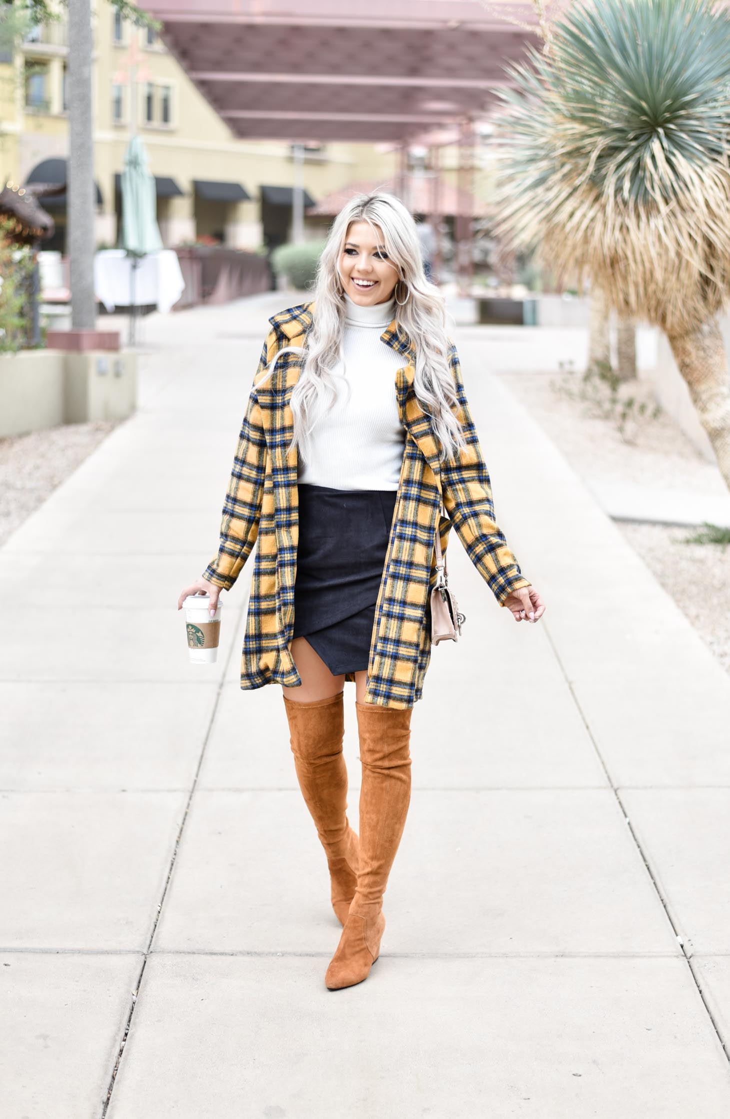 Erin Elizabeth of Wink and a Twirl shares this fabulous plaid coat from Shop Priceless