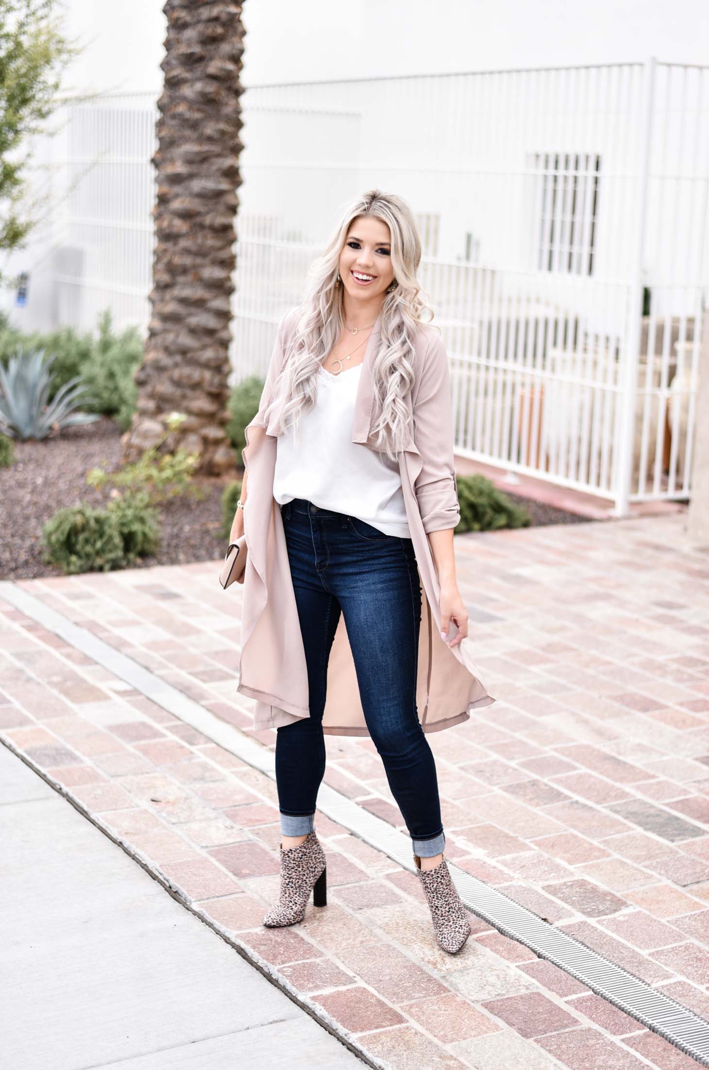 Erin Elizabeth of Wink and a Twirl shares the cutest blush duster and white cami from Fifth and Ivy