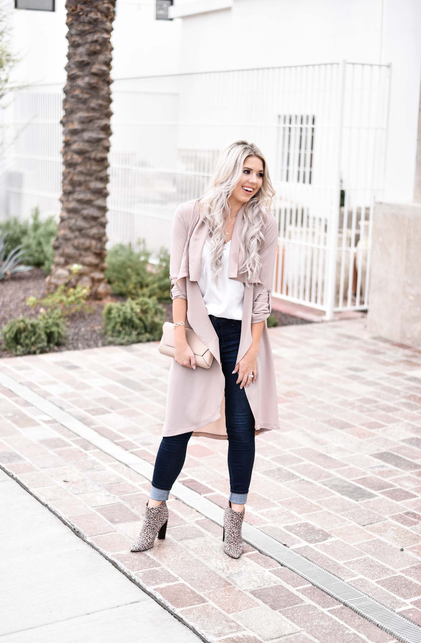 Erin Elizabeth of Wink and a Twirl shares the cutest blush duster and white cami from Fifth and Ivy