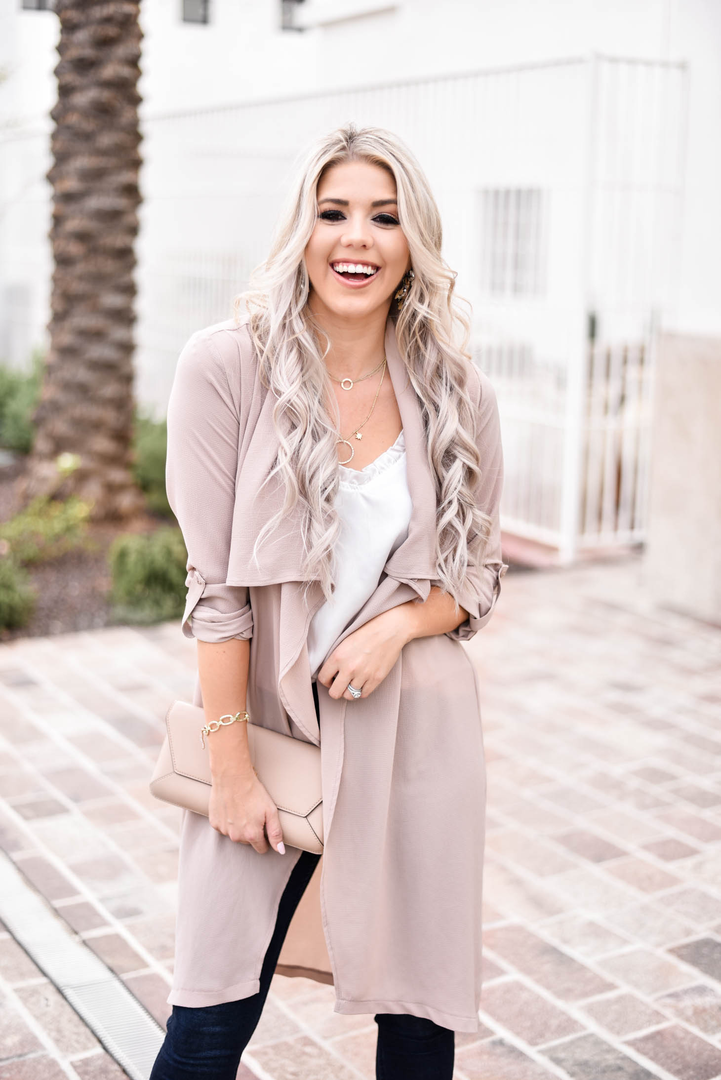 Erin Elizabeth of Wink and a Twirl shares the cutest blush duster and white cami from Fifth and Ivy