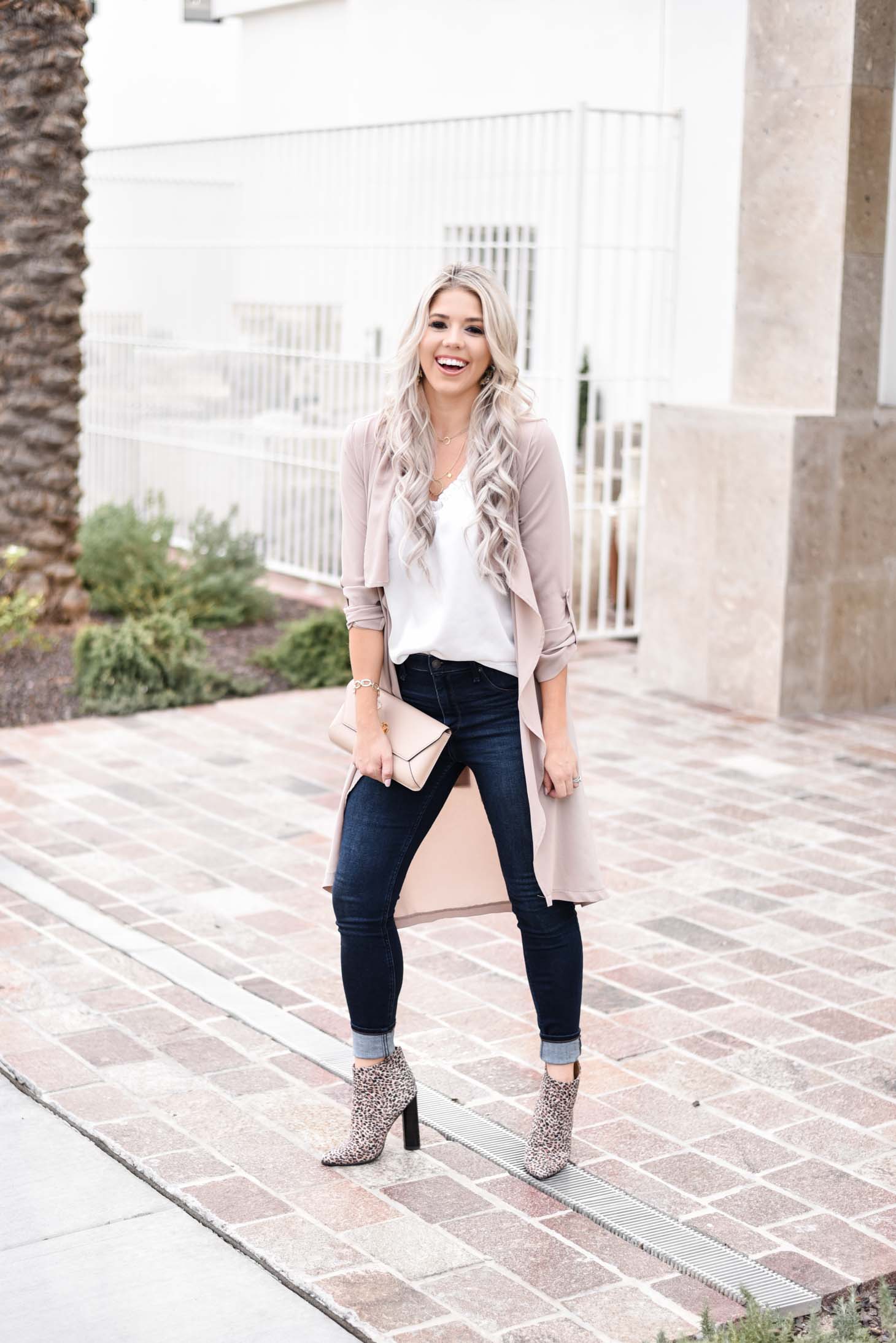 Erin Elizabeth of Wink and a Twirl shares the cutest blush duster and white cami from Fifth and Ivy