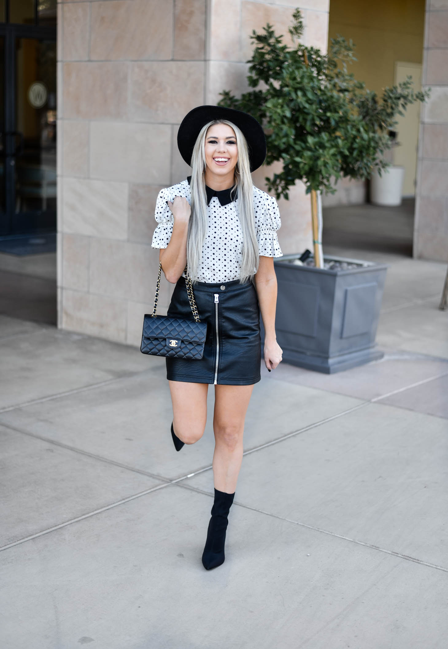 Erin Elizabeth of Wink and a Twirl shares the cutest CeCe Sportswear polka dot top and leather mini 