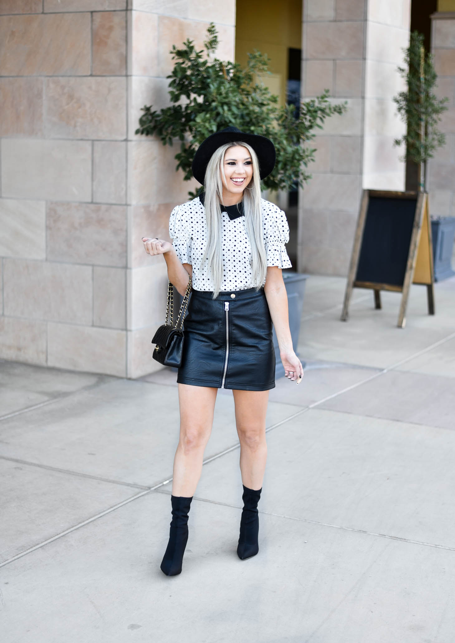 Erin Elizabeth of Wink and a Twirl shares the cutest CeCe Sportswear polka dot top and leather mini 