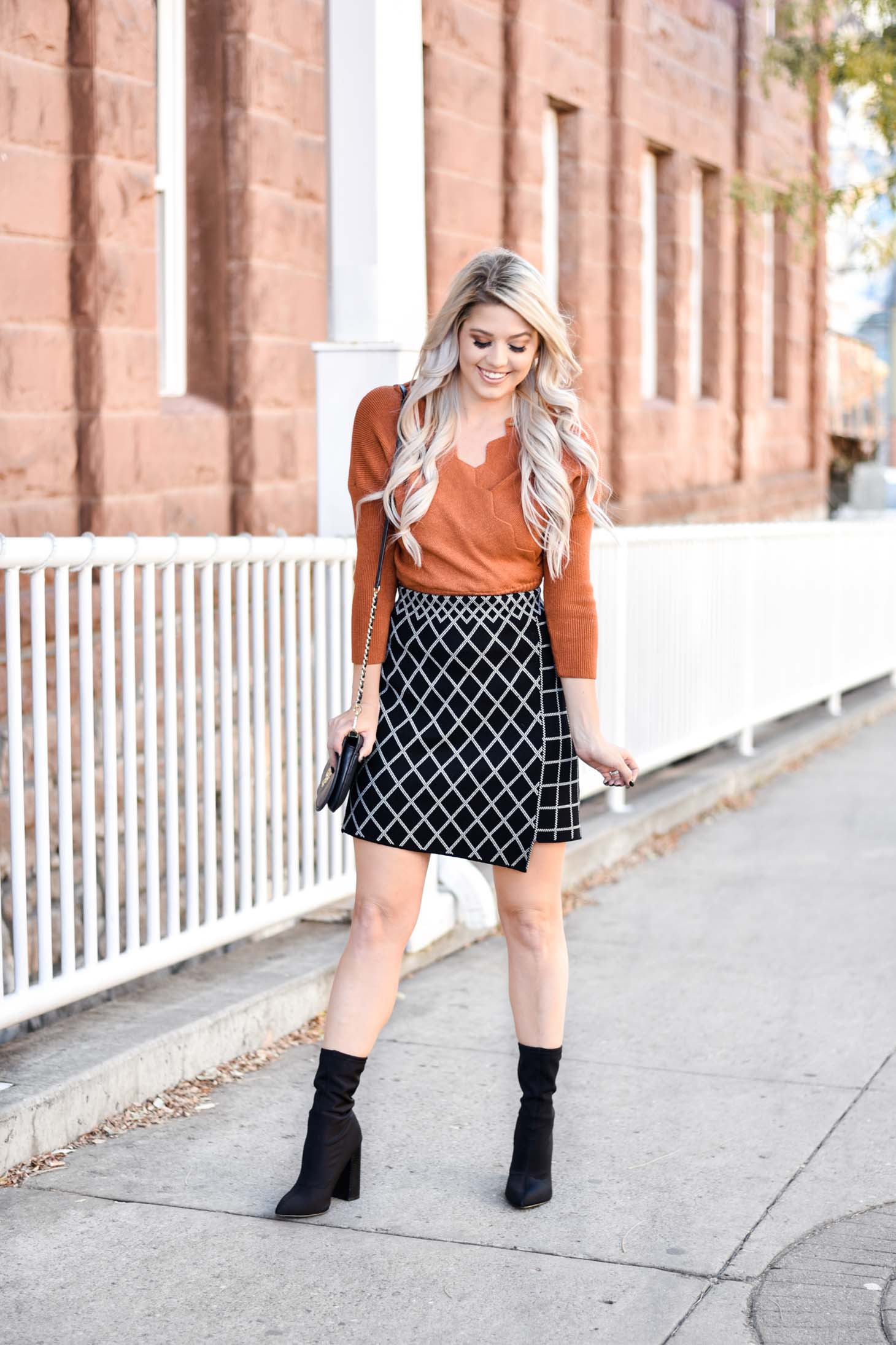 Erin Elizabeth of Wink and a Twirl shares the perfect Fall skirt and sweater combo from Chicwish