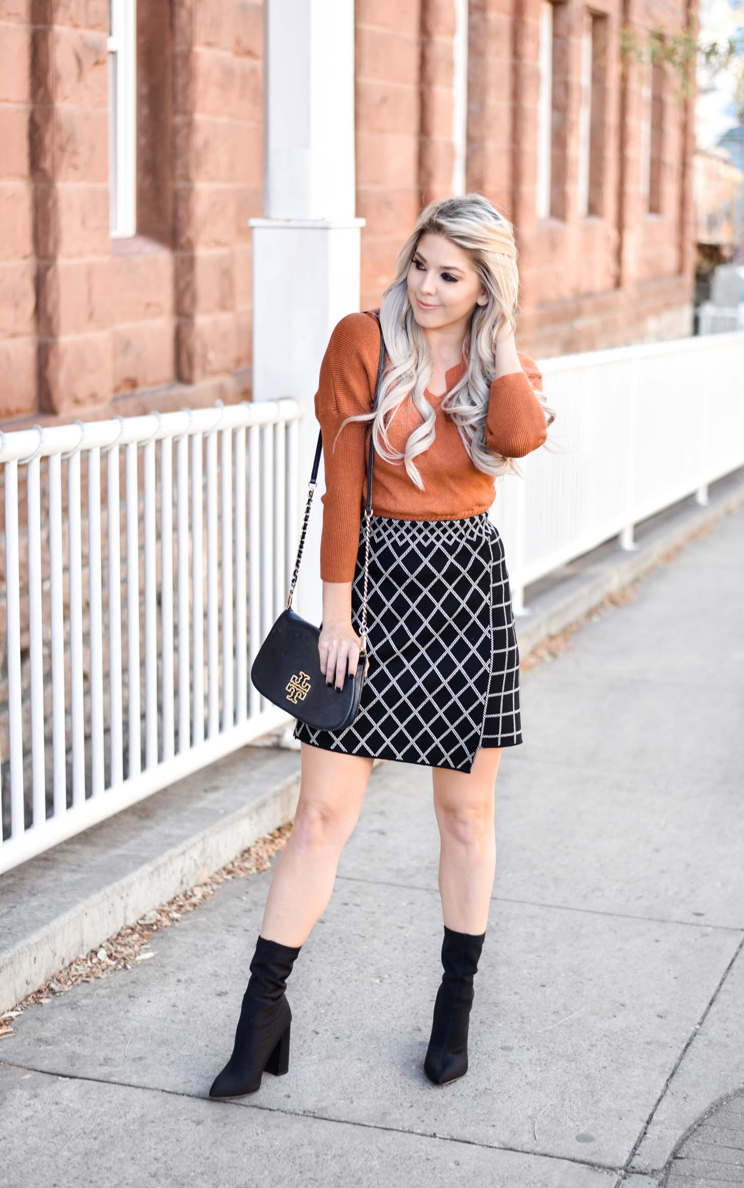 Erin Elizabeth of Wink and a Twirl shares the perfect Fall skirt and sweater combo from Chicwish