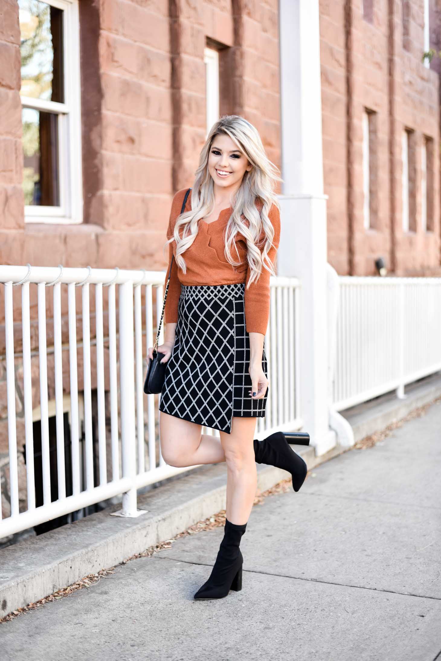 Erin Elizabeth of Wink and a Twirl shares the perfect Fall skirt and sweater combo from Chicwish