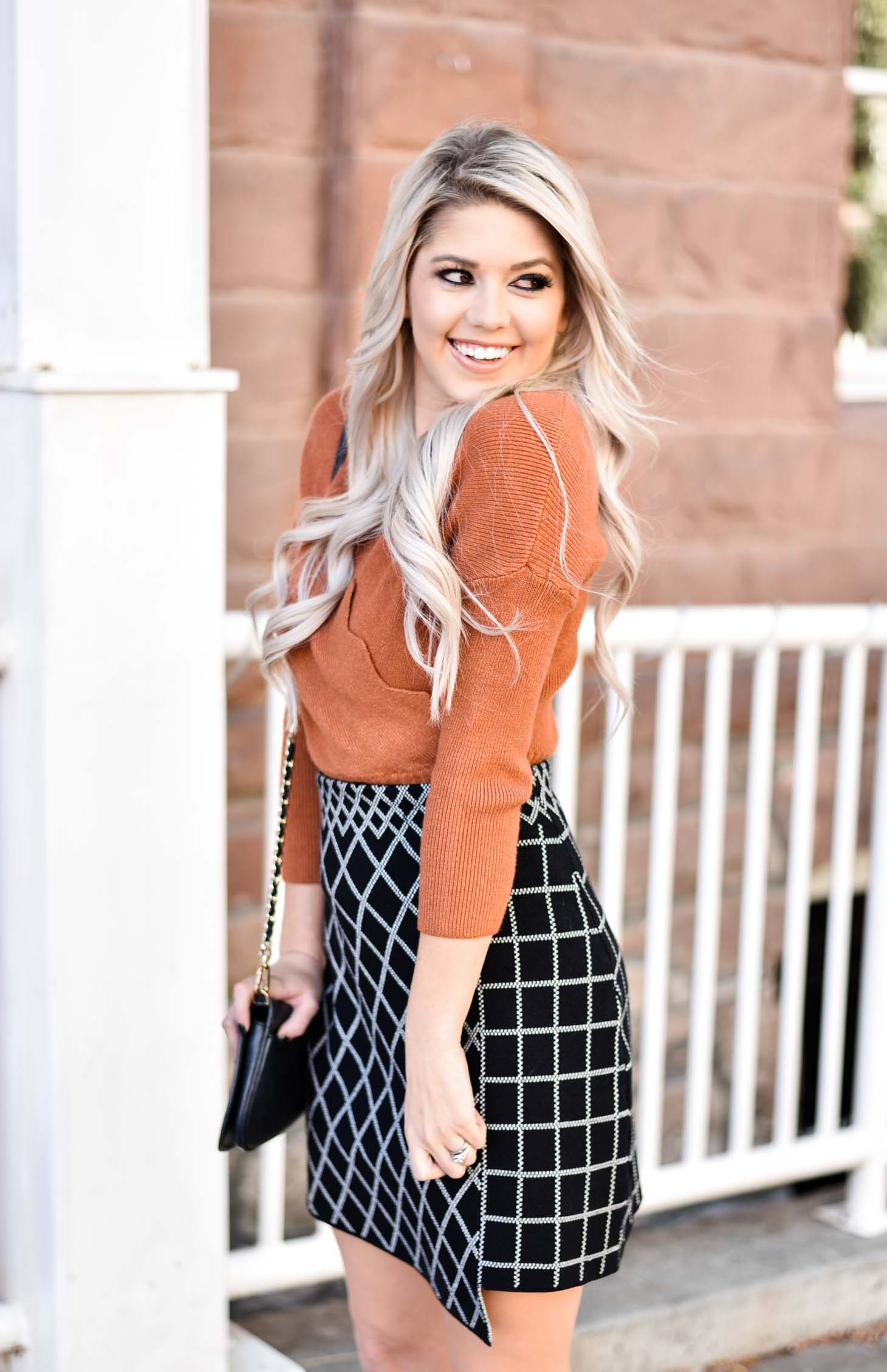 Erin Elizabeth of Wink and a Twirl shares the perfect Fall skirt and sweater combo from Chicwish