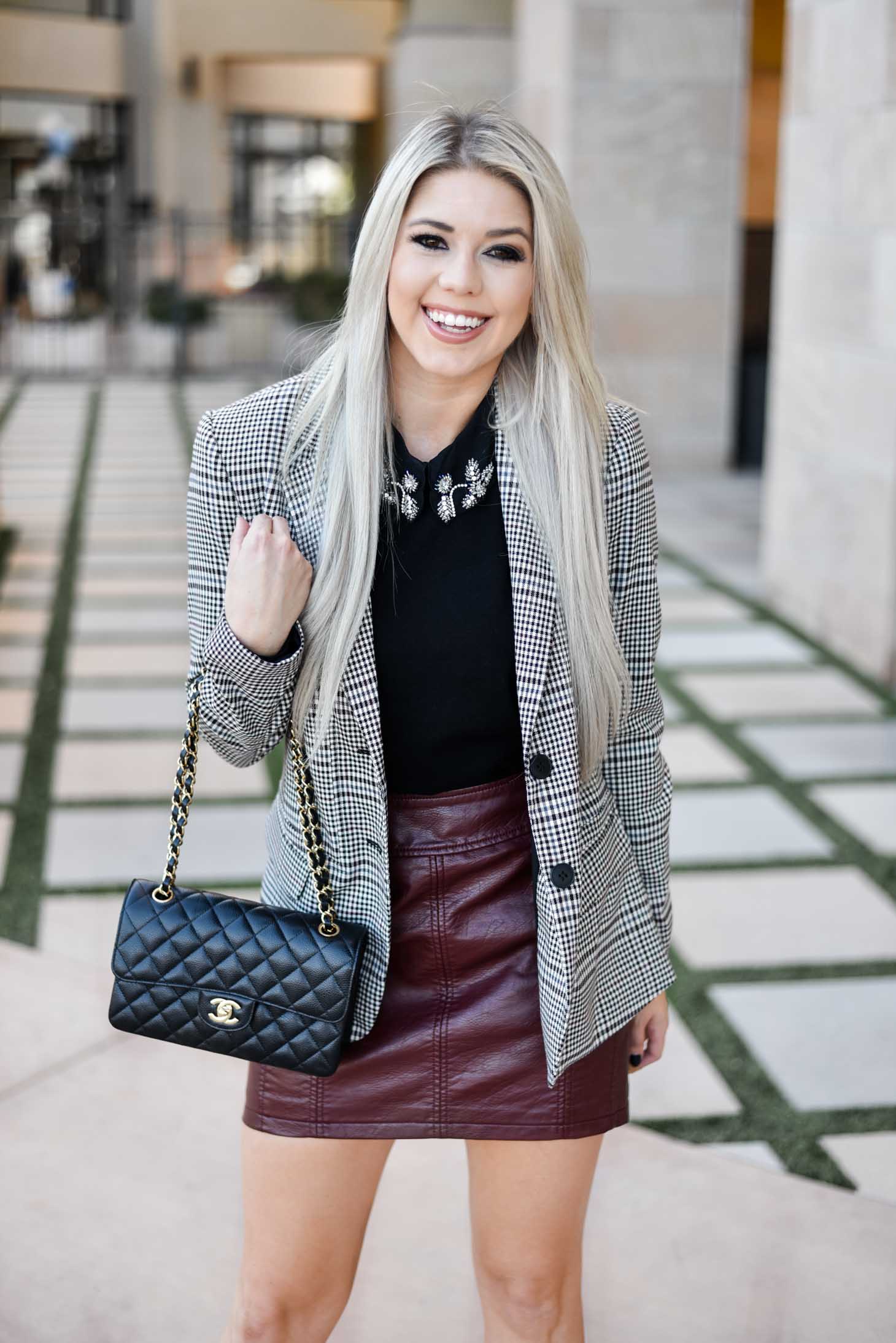 Erin Elizabeth of Wink and a Twirl shares the perfect way to style a leather mini this fall