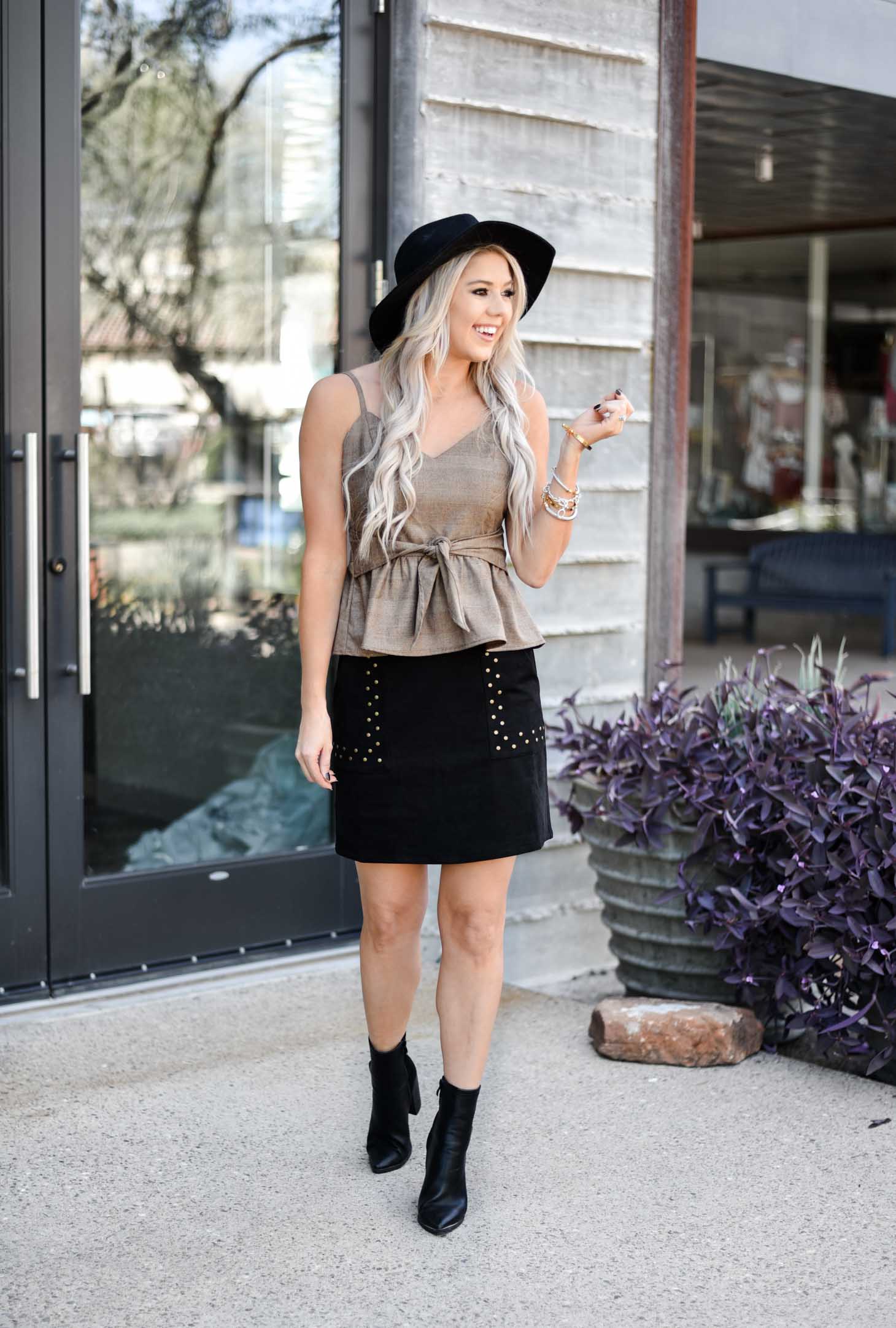 Erin Elizabeth of Wink and a Twirl shares a cute skirt and boot look from Shop Sugar Lips