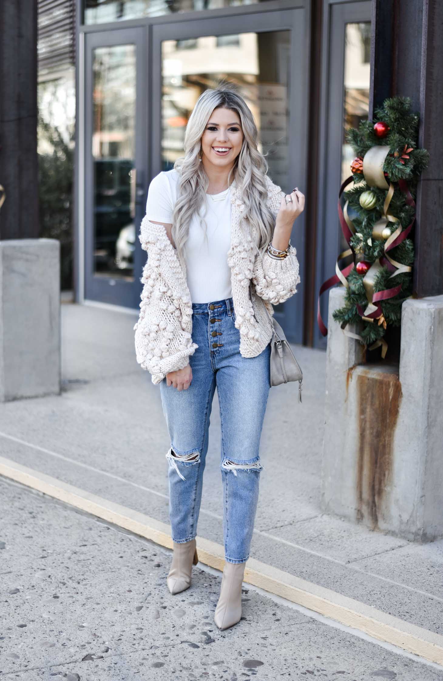 Erin Elizabeth of Wink and a Twirl shares the must have winter chunky cardigan from Chicwish
