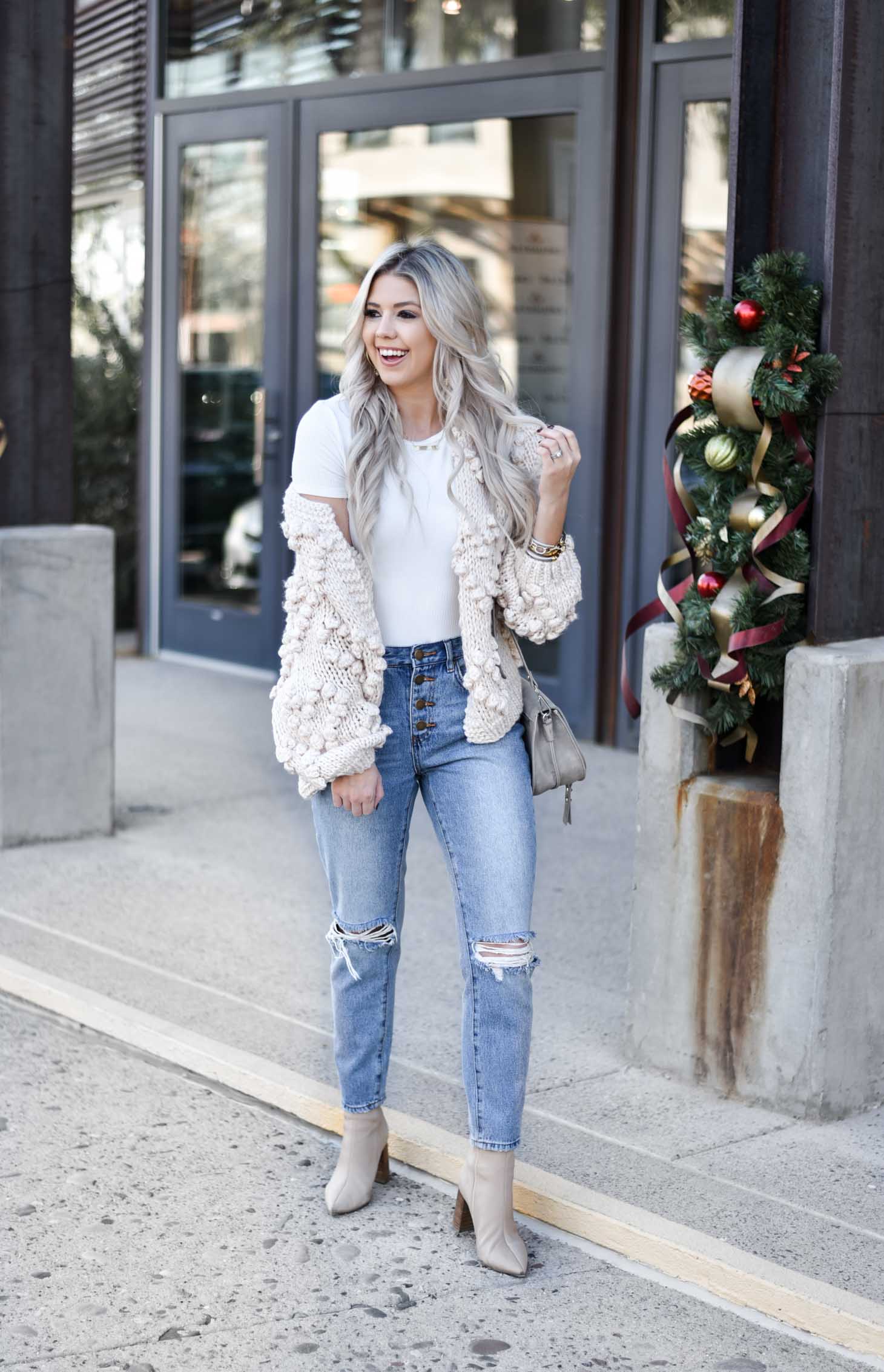 Erin Elizabeth of Wink and a Twirl shares the must have winter chunky cardigan from Chicwish
