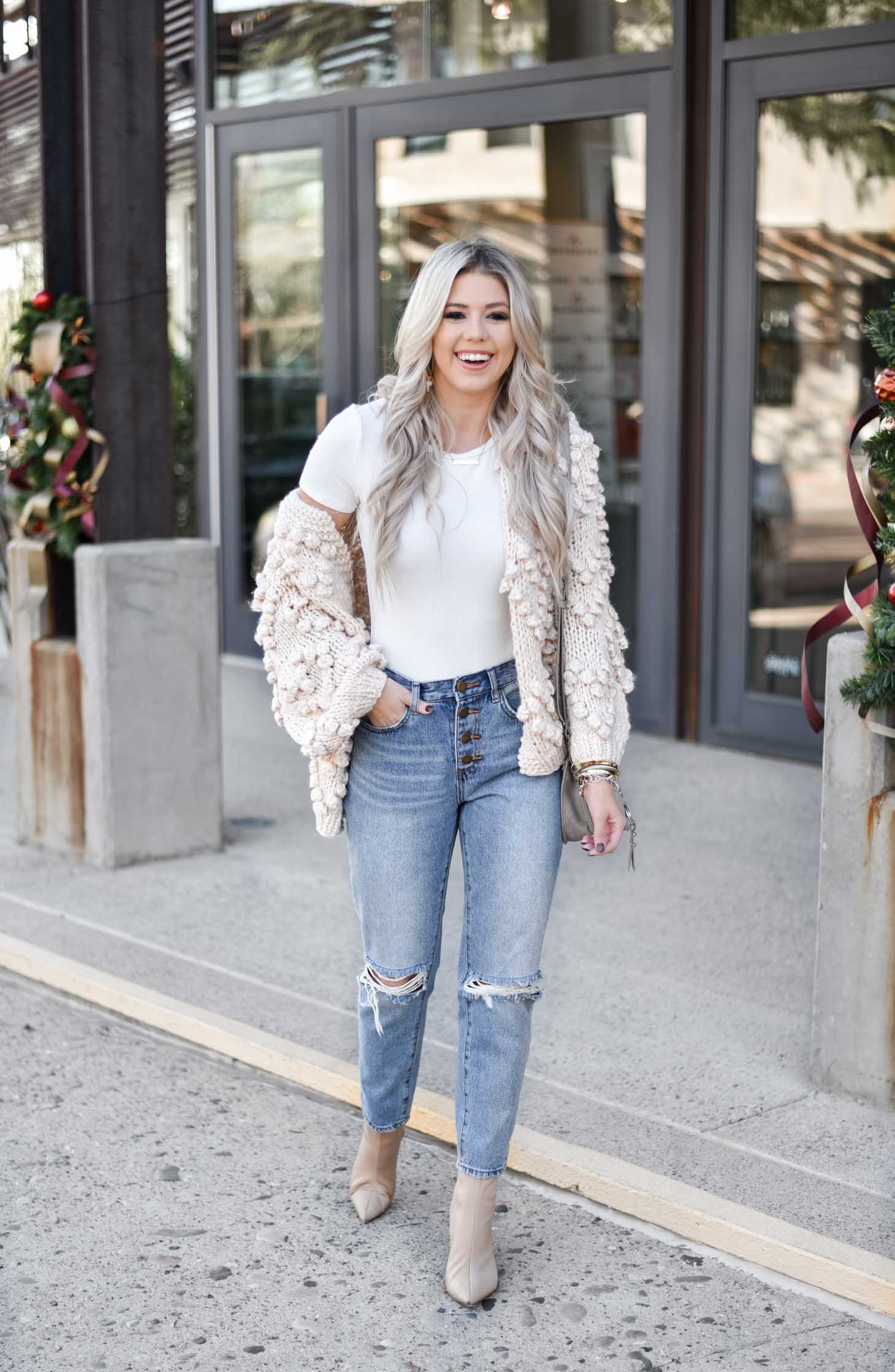 Erin Elizabeth of Wink and a Twirl shares the must have winter chunky cardigan from Chicwish