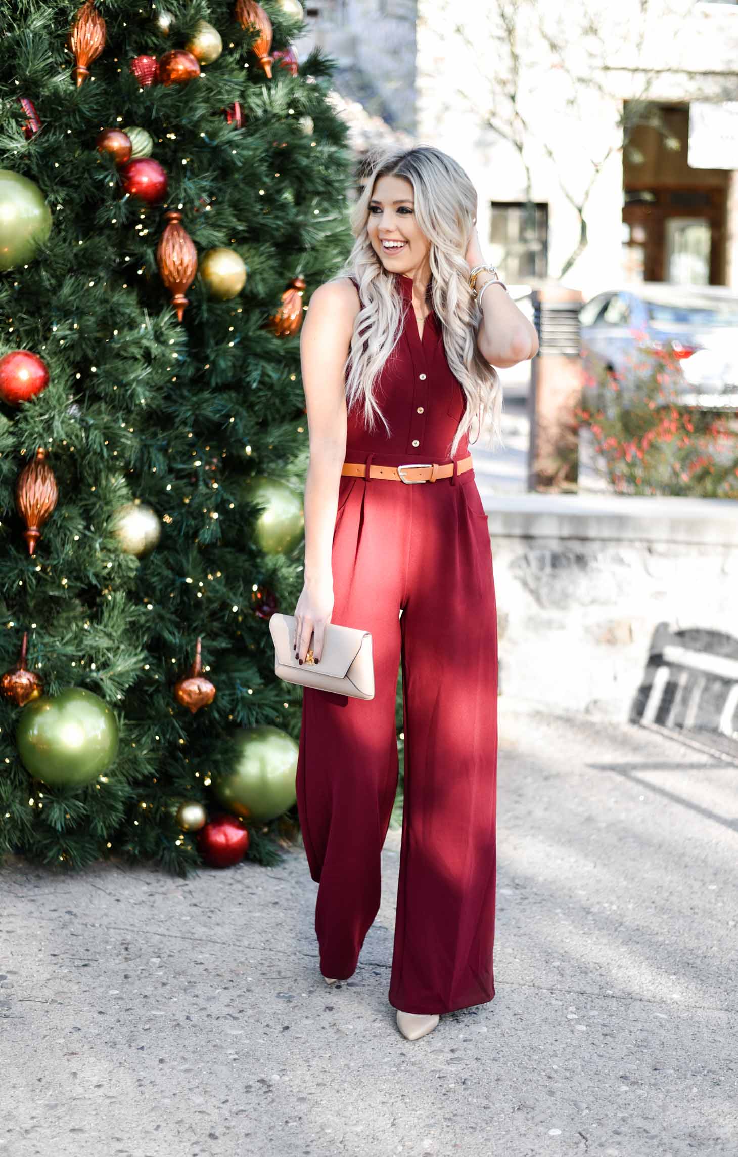 Erin Elizabeth of Wink and a Twirl share the perfect holiday jumpsuit from The Pink Lily Boutique