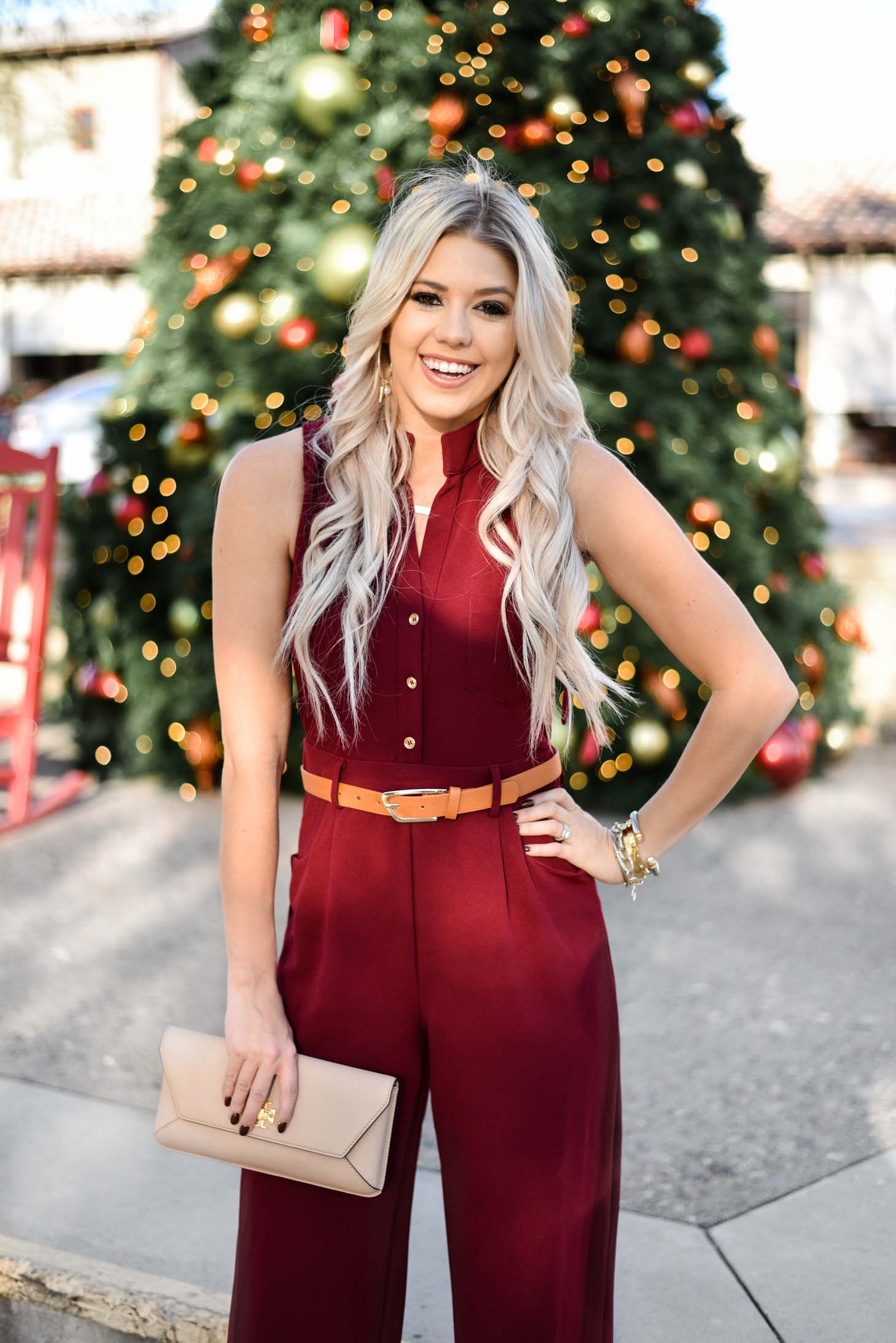 Erin Elizabeth of Wink and a Twirl share the perfect holiday jumpsuit from The Pink Lily Boutique