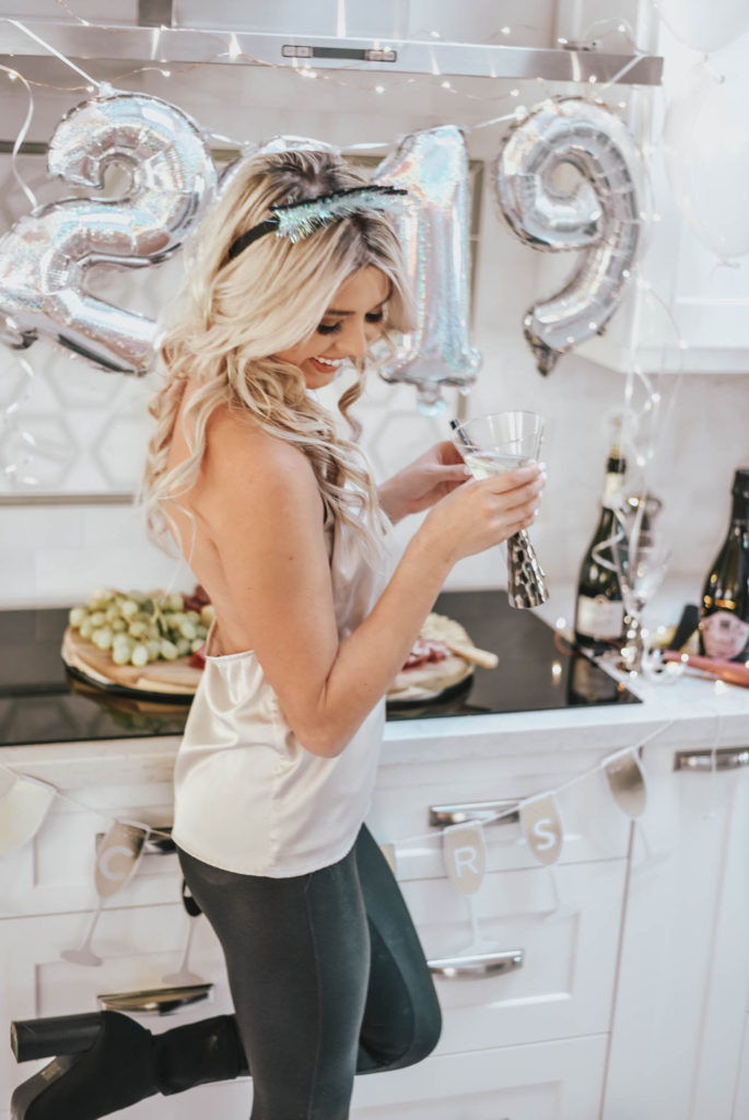 Erin Elizabeth of Wink and a Twirl shares the perfect party top and leggings for New Years Eve