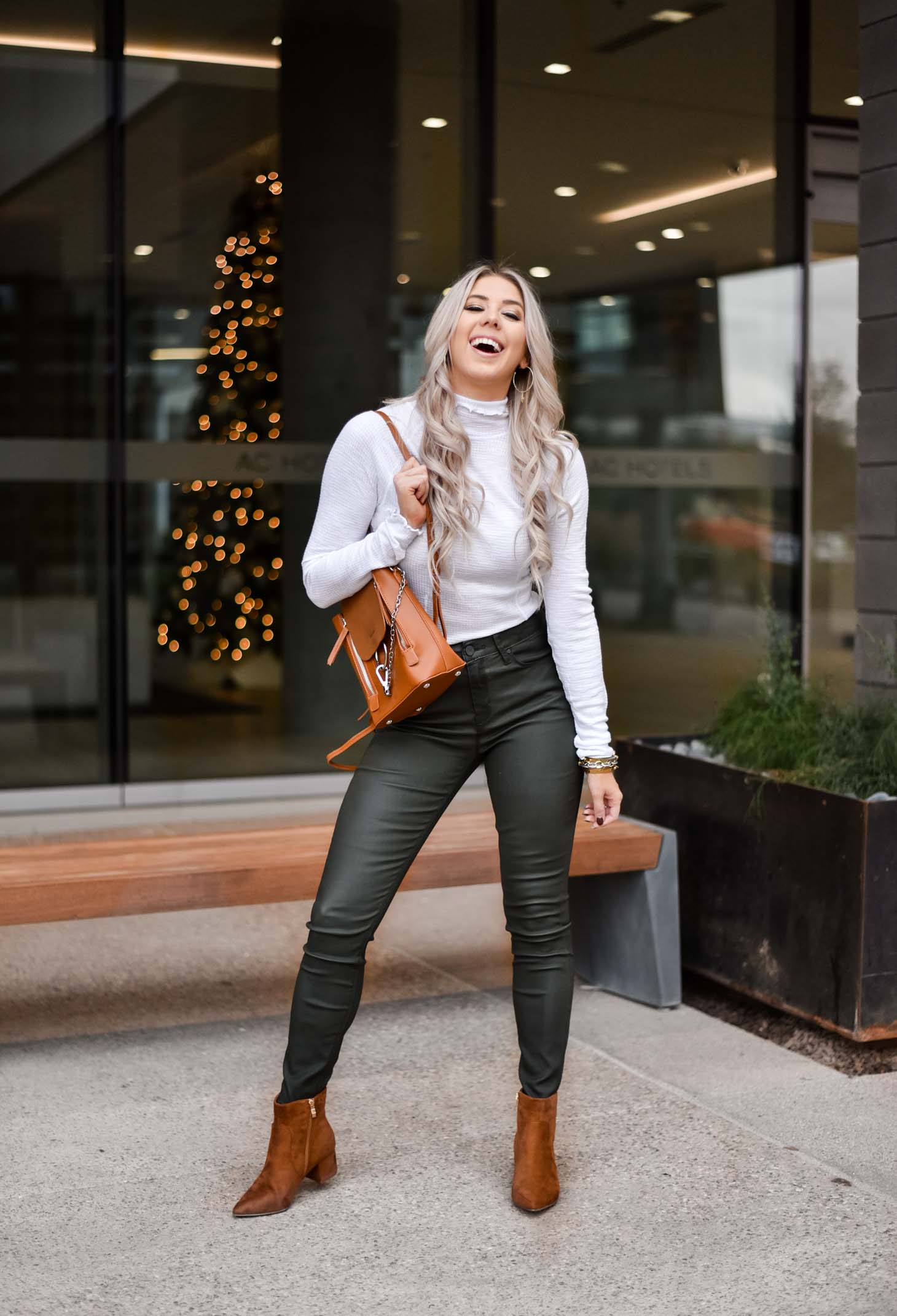 Erin Elizabeth of Wink and a Twirl shares the perfect leather pants and turtleneck look from Lulus during her stay at the AC Hotel Phoenix Biltmore in Phoenix, Arizona