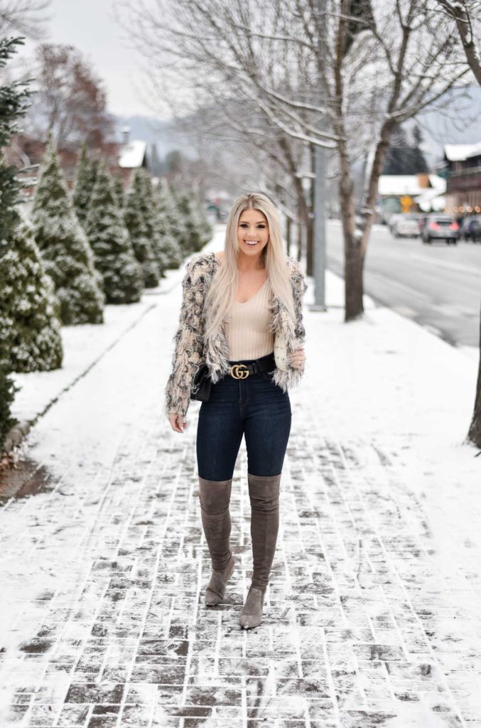 Erin Elizabeth of Wink and a Twirl share the perfect winter faux fur jacket from Windsor