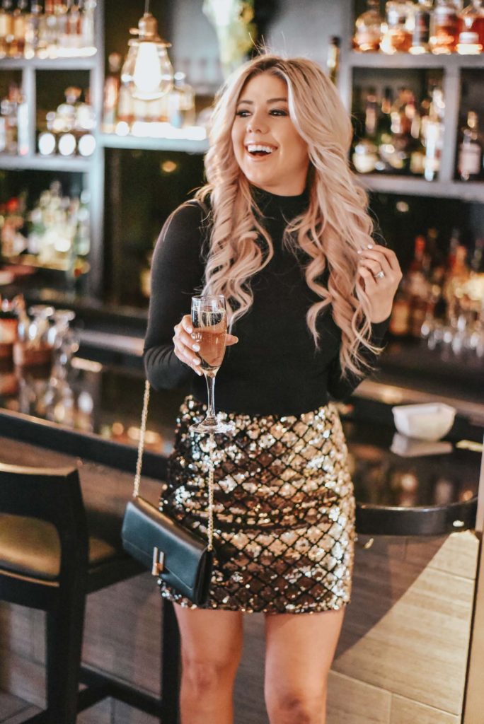 Erin Elizabeth of Wink and a Twirl shares her go to New Years Eve look from Red Dress Boutique, as well as other New Years Eve Looks