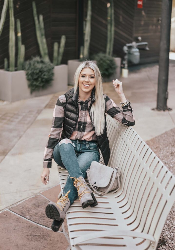 Erin Elizabeth of Wink and a Twirl shares the perfect plaid top and black puffer vest! A perfect casual, winter look!