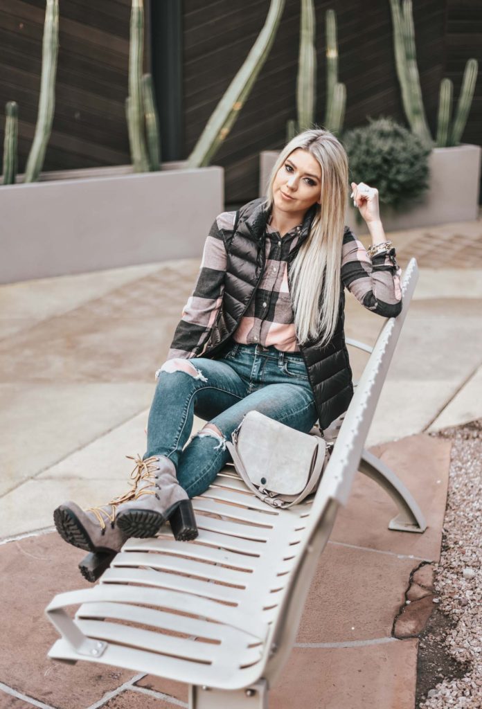 Erin Elizabeth of Wink and a Twirl shares the perfect plaid top and black puffer vest! A perfect casual, winter look!