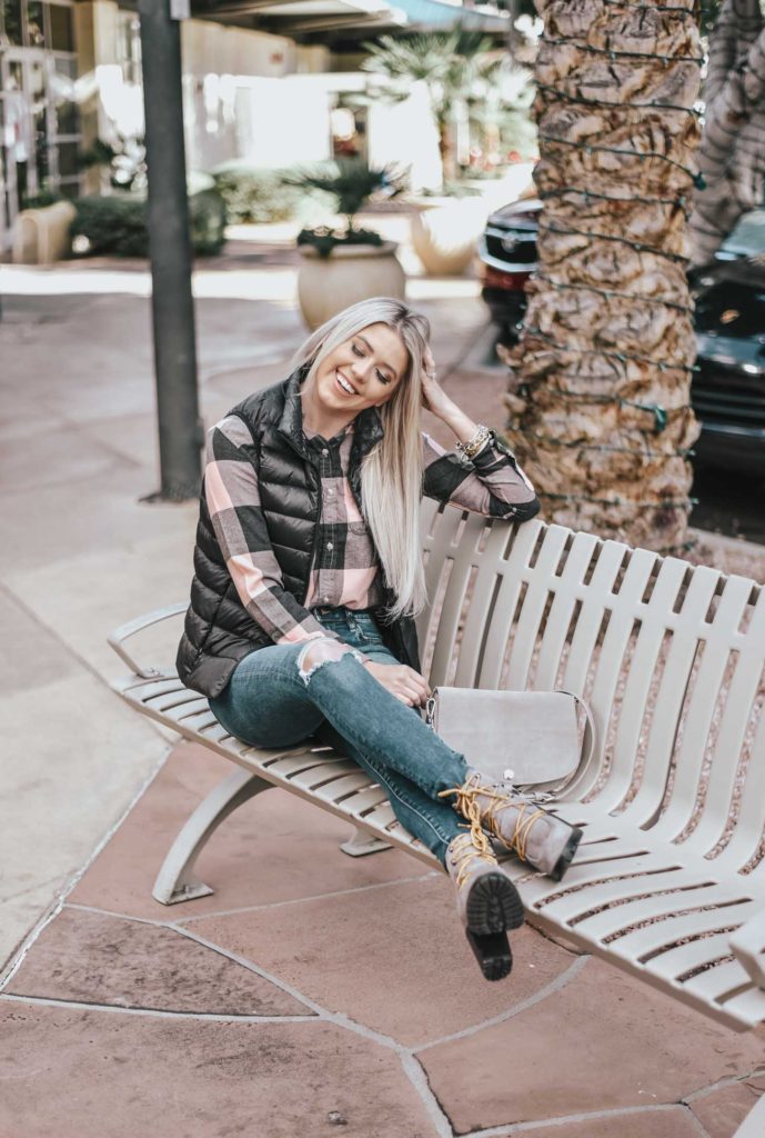 Erin Elizabeth of Wink and a Twirl shares the perfect plaid top and black puffer vest! A perfect casual, winter look!