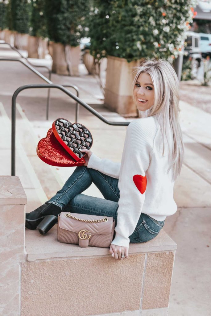 Erin Elizabeth of Wink and a Twirl shares the perfect heart elbow sweater from Chicwish, as well as some other super cute VDay Sweaters