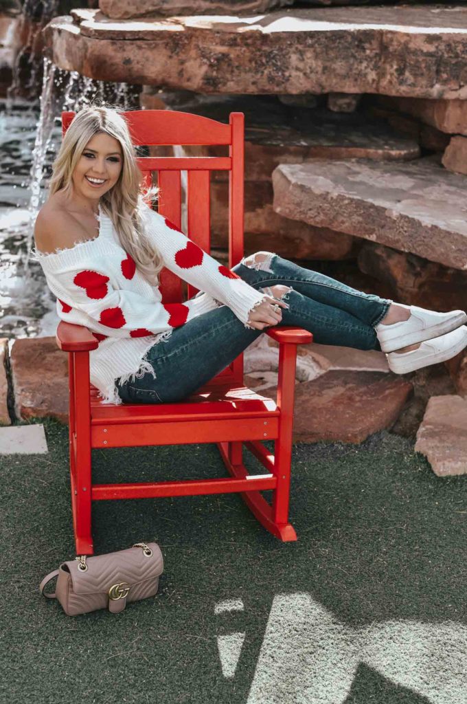 Erin Elizabeth of Wink and a Twirl shares the cutest heart sweater for Valentine's Day from Magnolia Boutique 